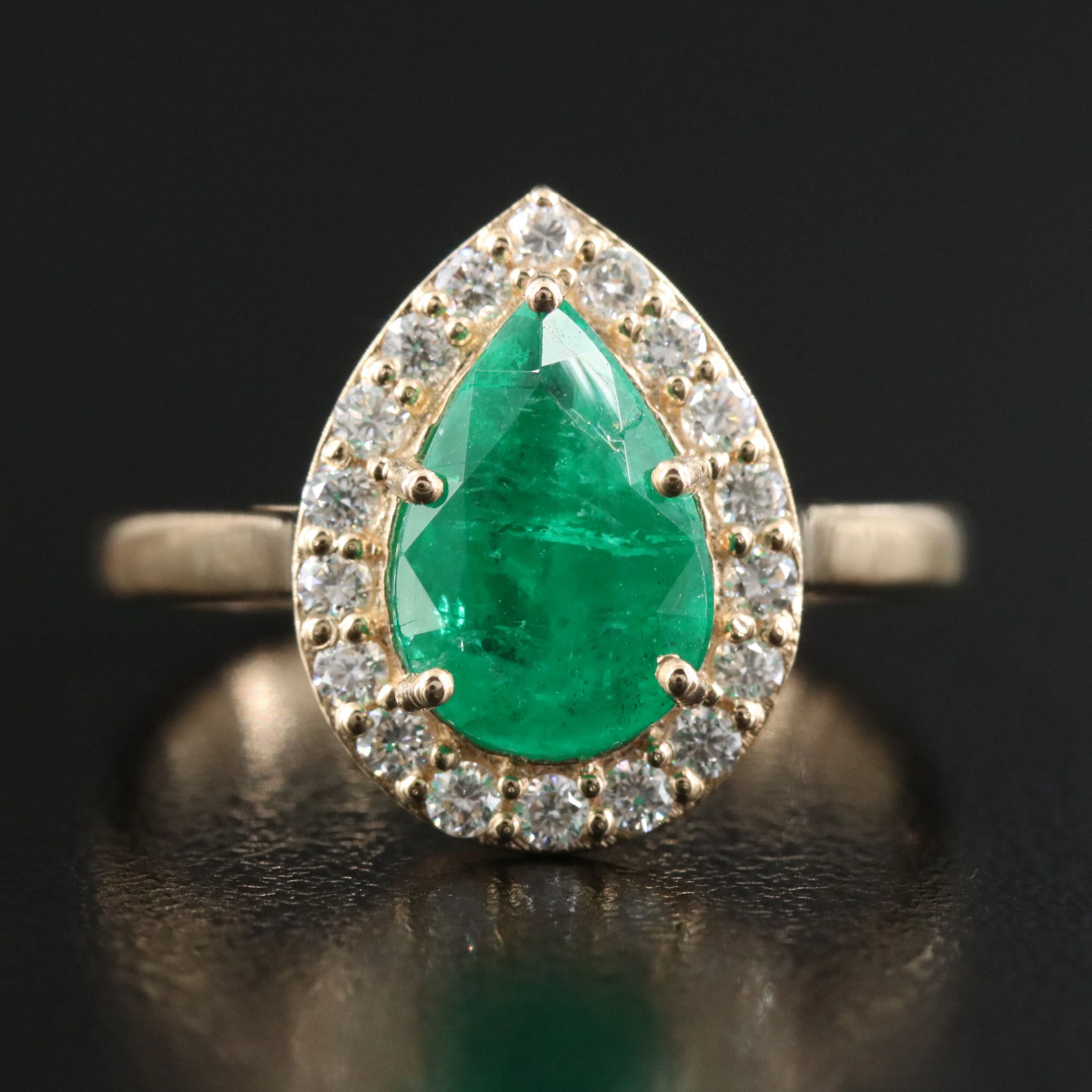 18K 1.56 CT Emerald Ring with Diamond Halo