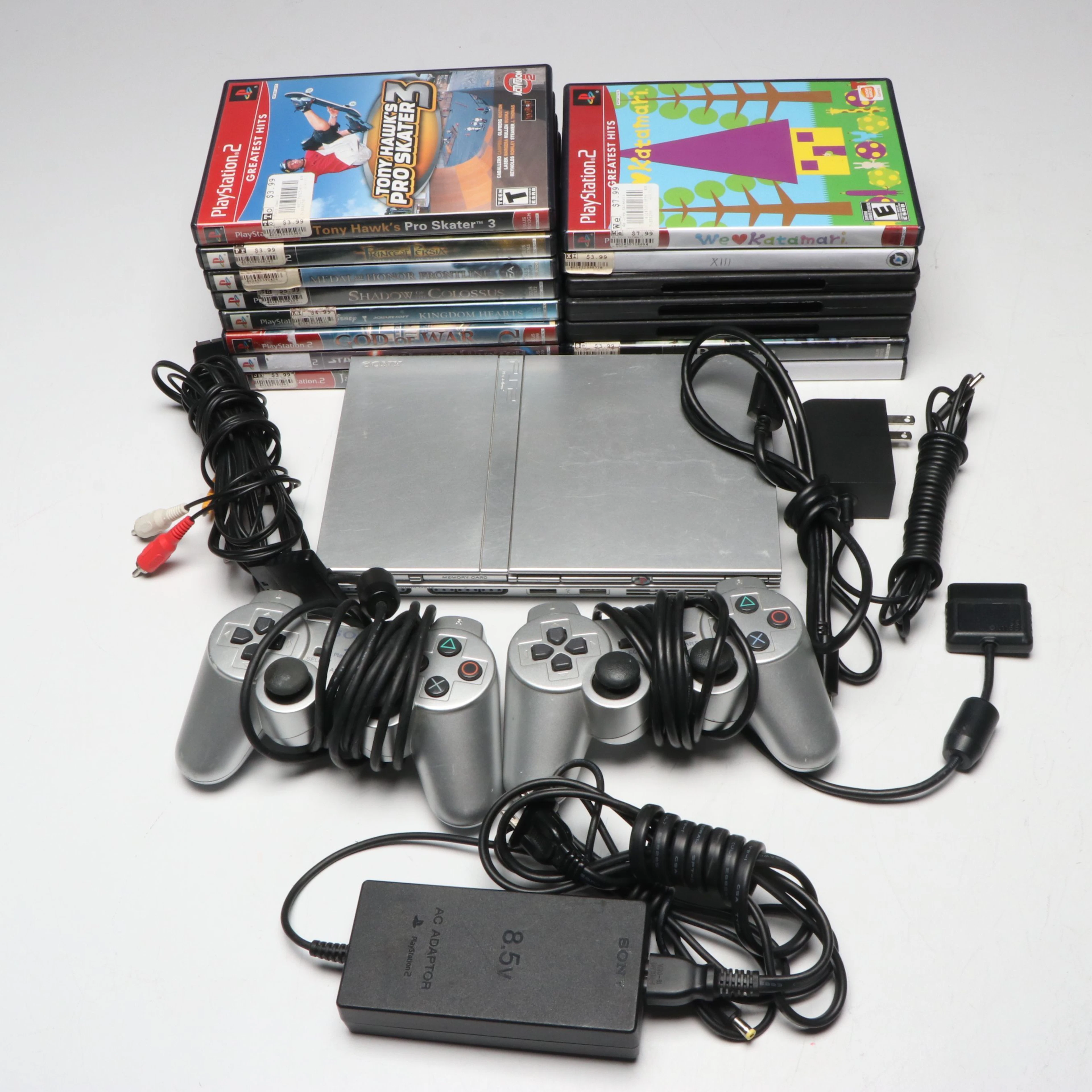 Sony PlayStation 2 with Controllers and Video Games