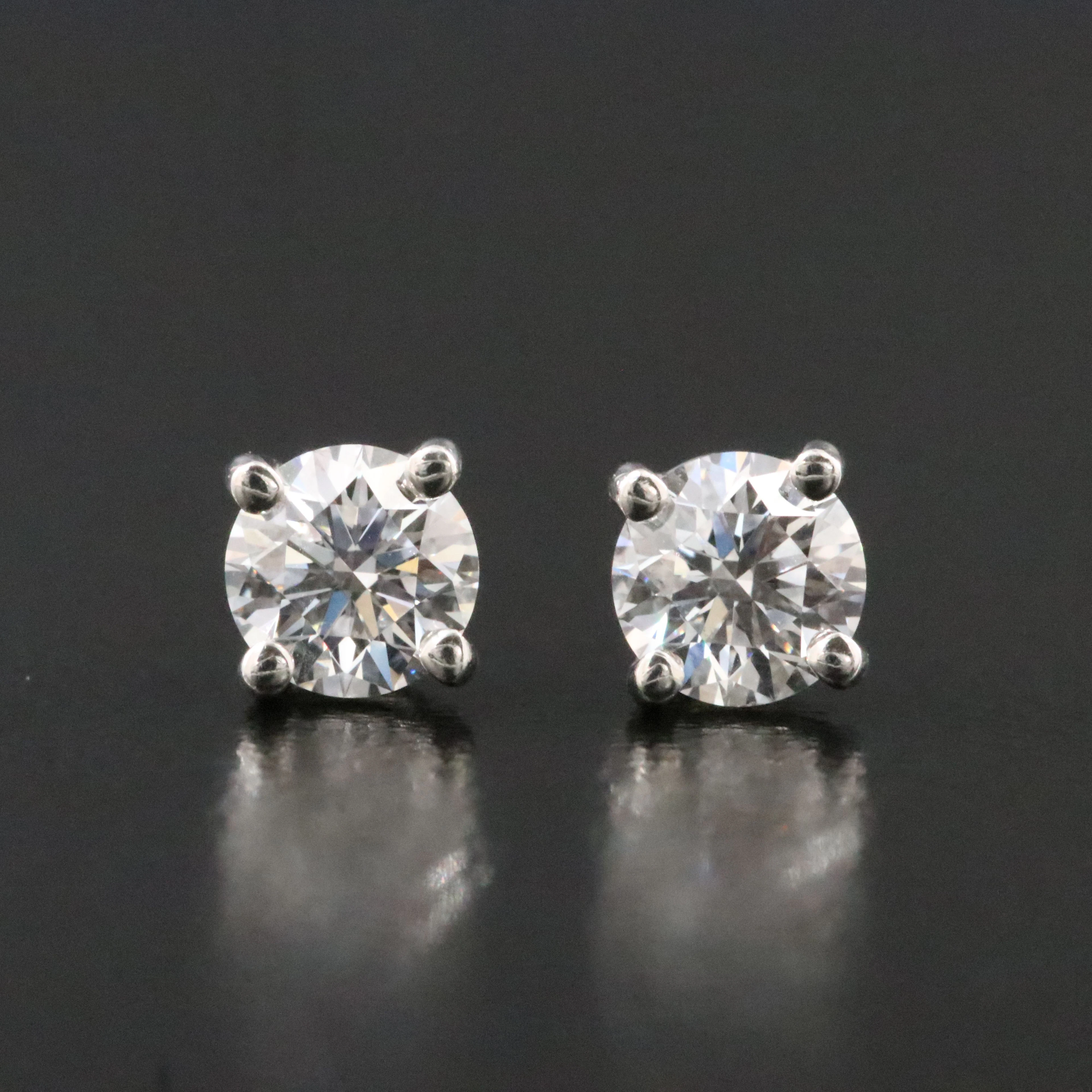 Tiffany & Co. Platinum 0.70 CTW Diamond Solitaire Earrings with Tiffany Certs