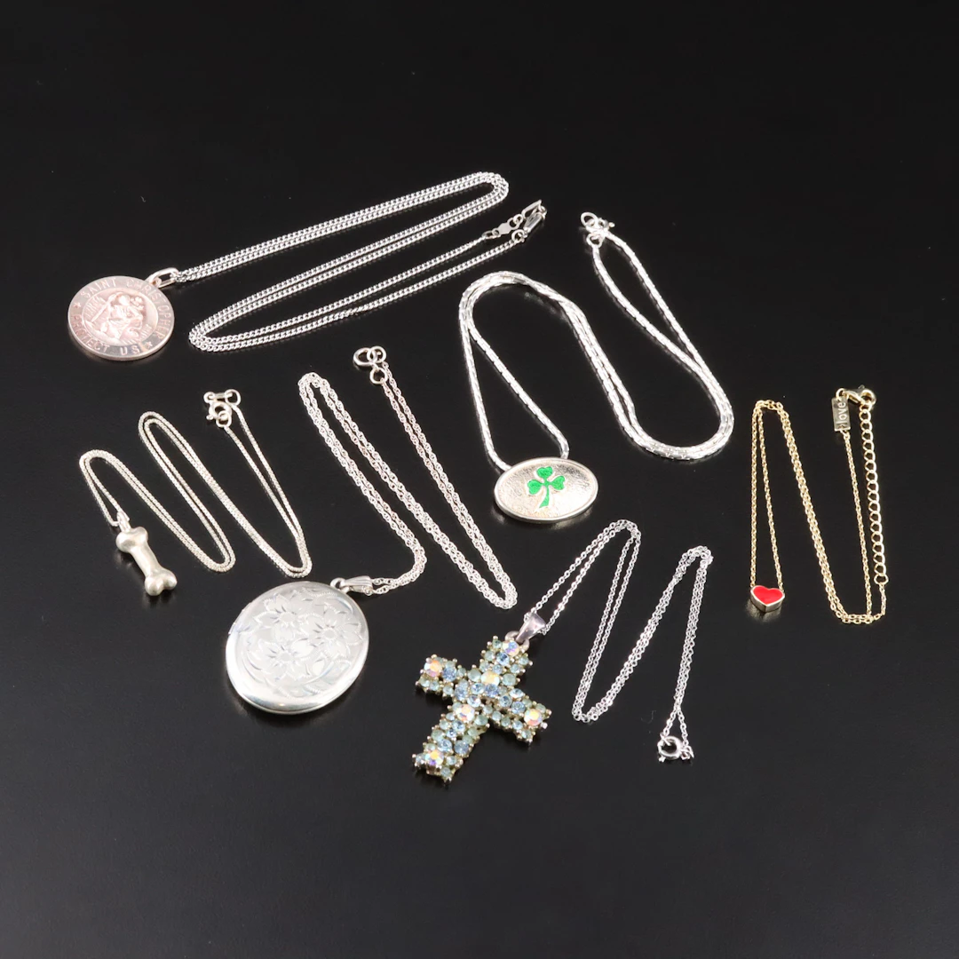 St. Christopher, Dog Bone and Sterling Featured in Necklaces