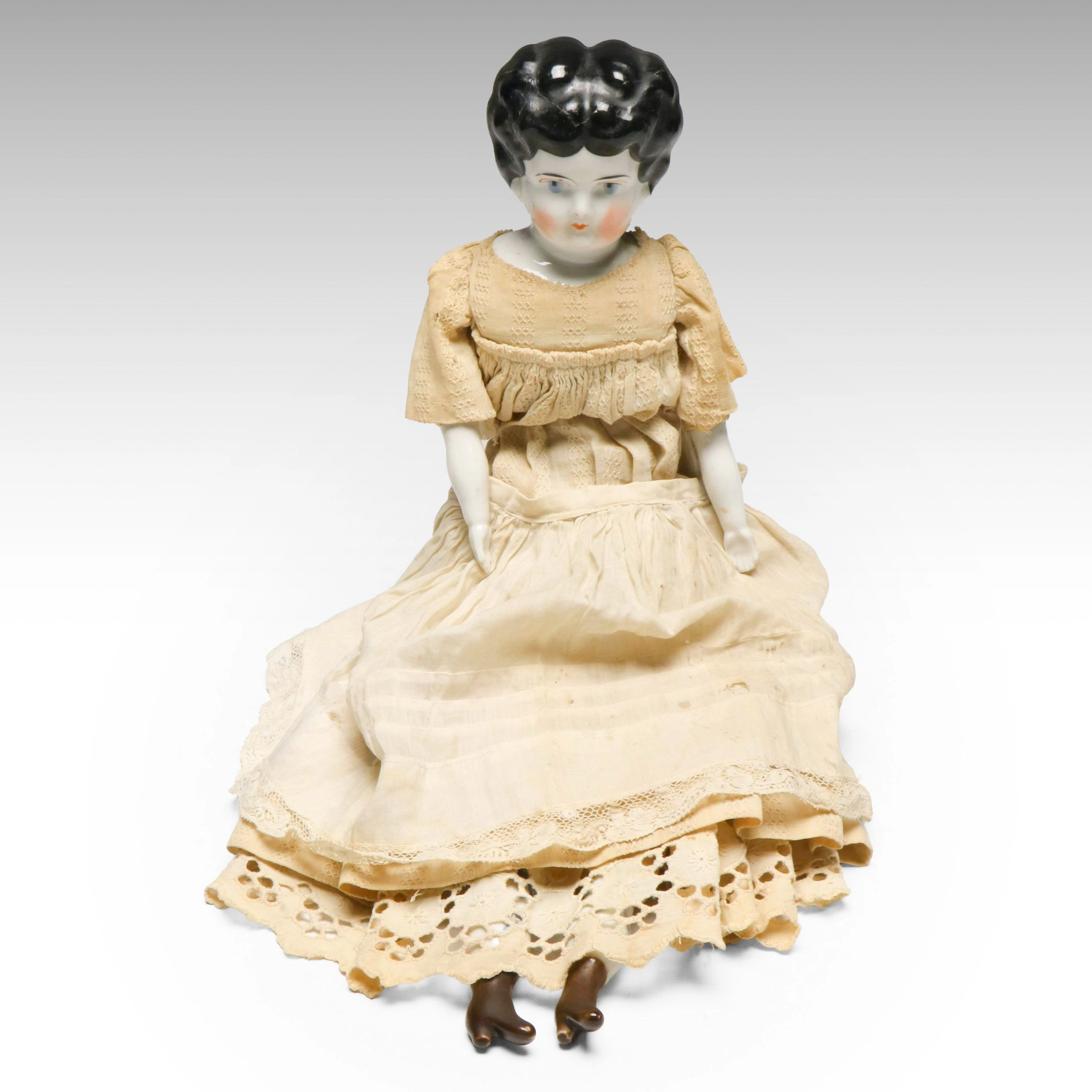German Low Brow China Head Doll with Cloth Body and Porcelain Arms and Legs