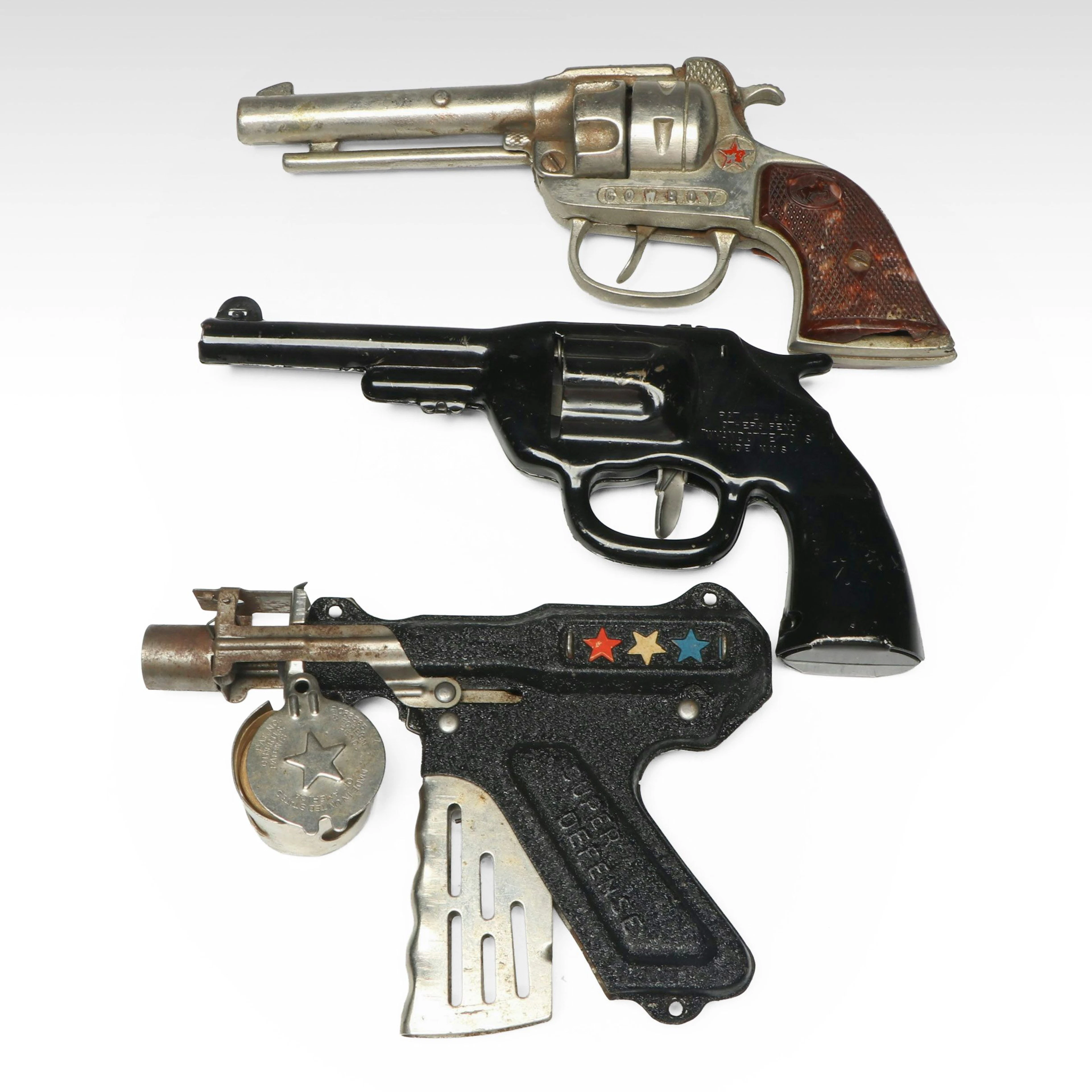 Langson "Super Defense" Paper Buster with Other Toy Guns, Mid-20th Century
