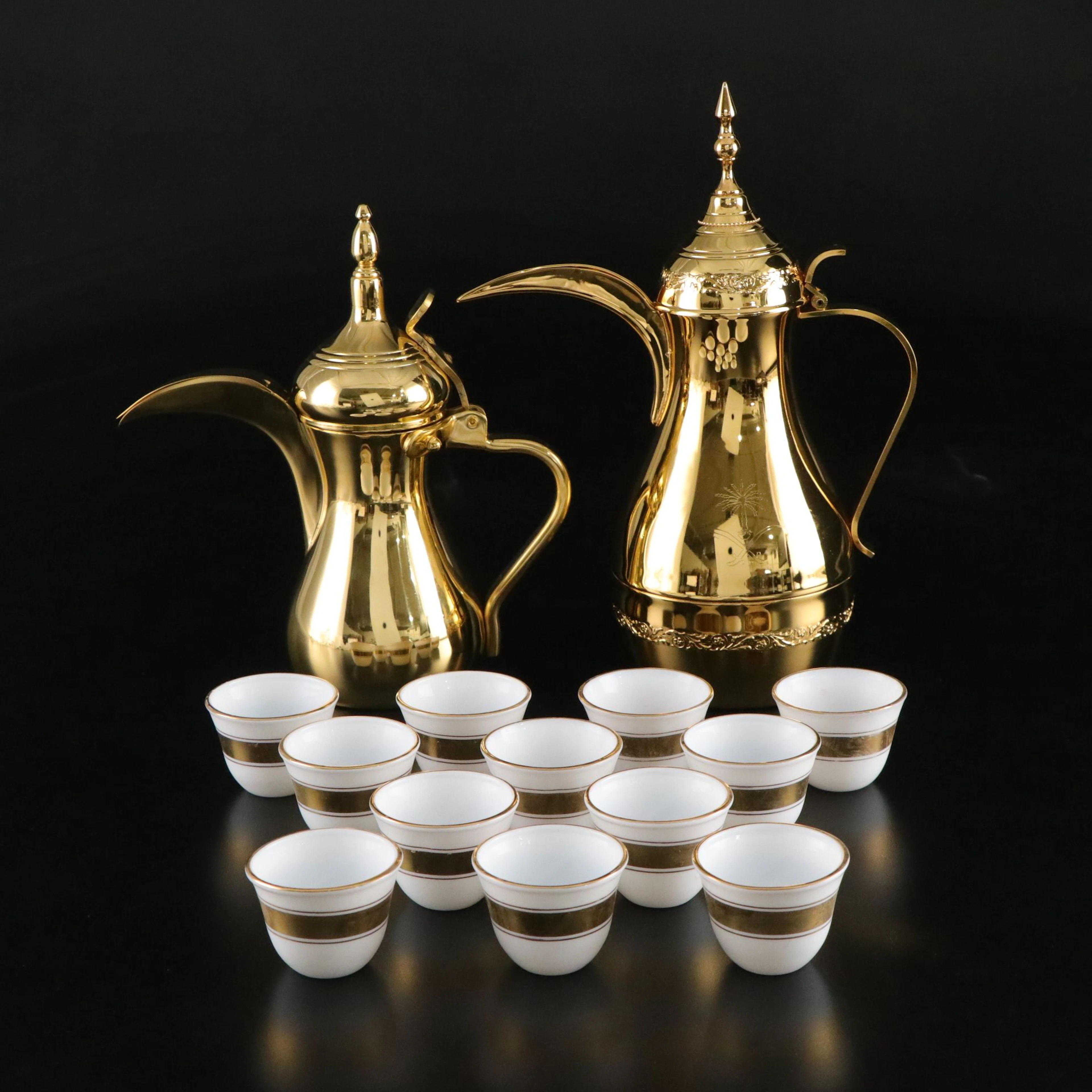 Pair of Saudi Arabia Teapots with Cups, Late 20th/ Early 21st Century