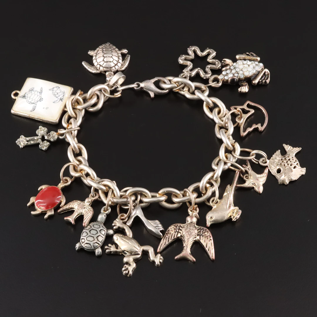 Vintage Charm Bracelet Including Articulated & Sterling