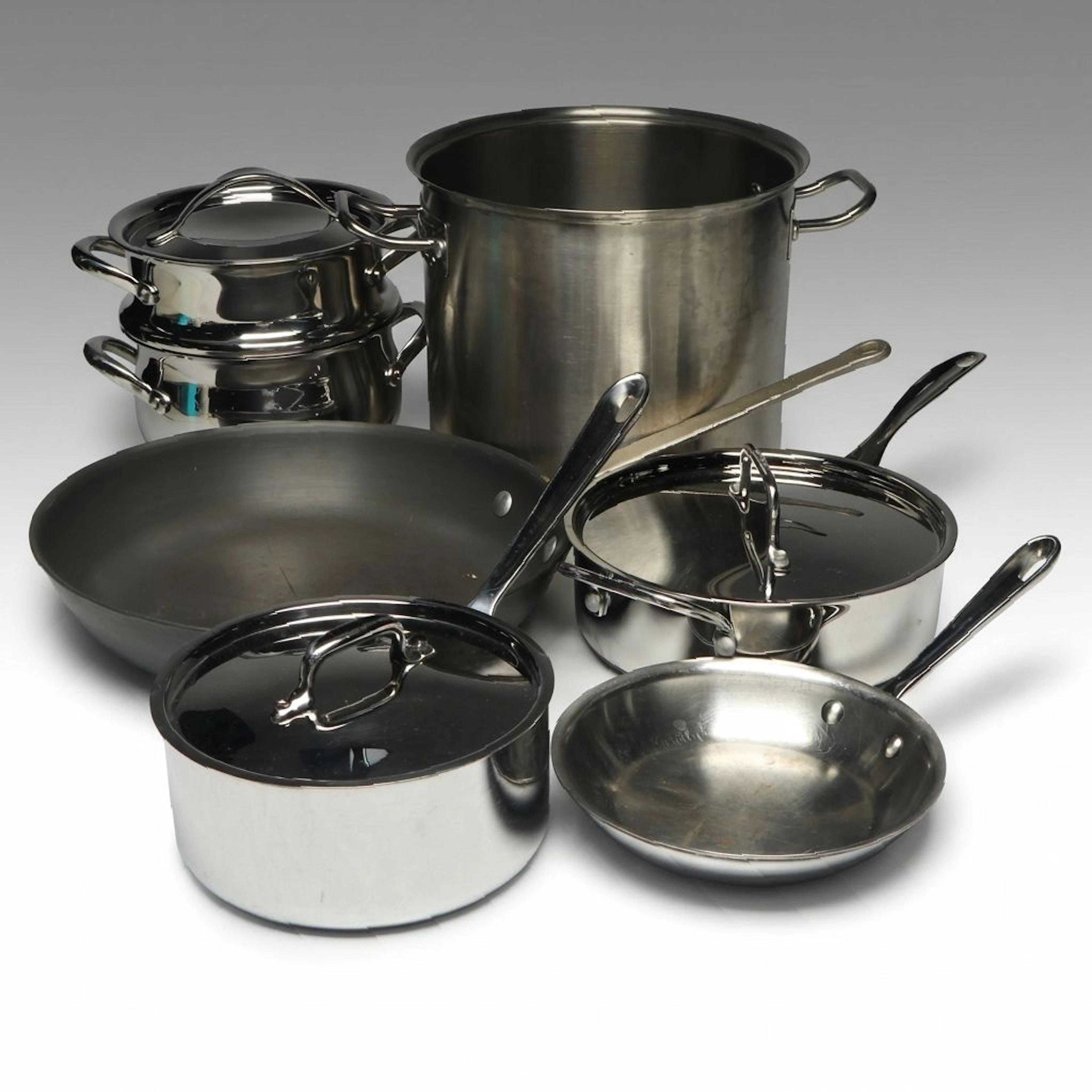 All-Clad Stainless Steel Saucepan and Skillet with More Pots and Pans