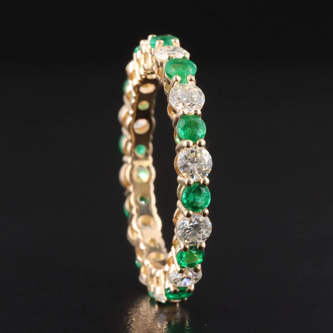 14K 1.32 CTW Diamond and Emerald Eternity Band