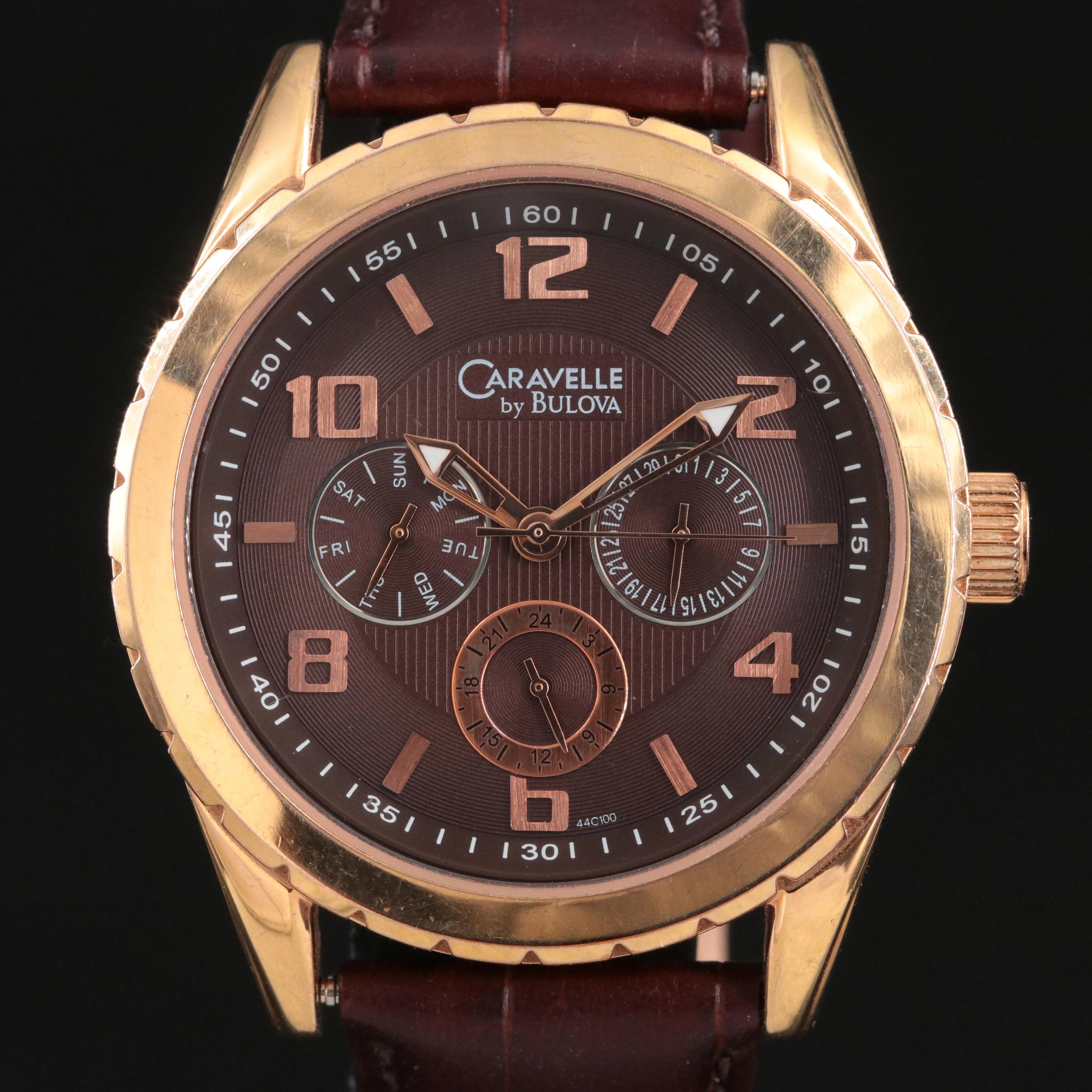 Caravelle by Bulova Day, Date, 24 hour Sub Dials Gold Tone Watch