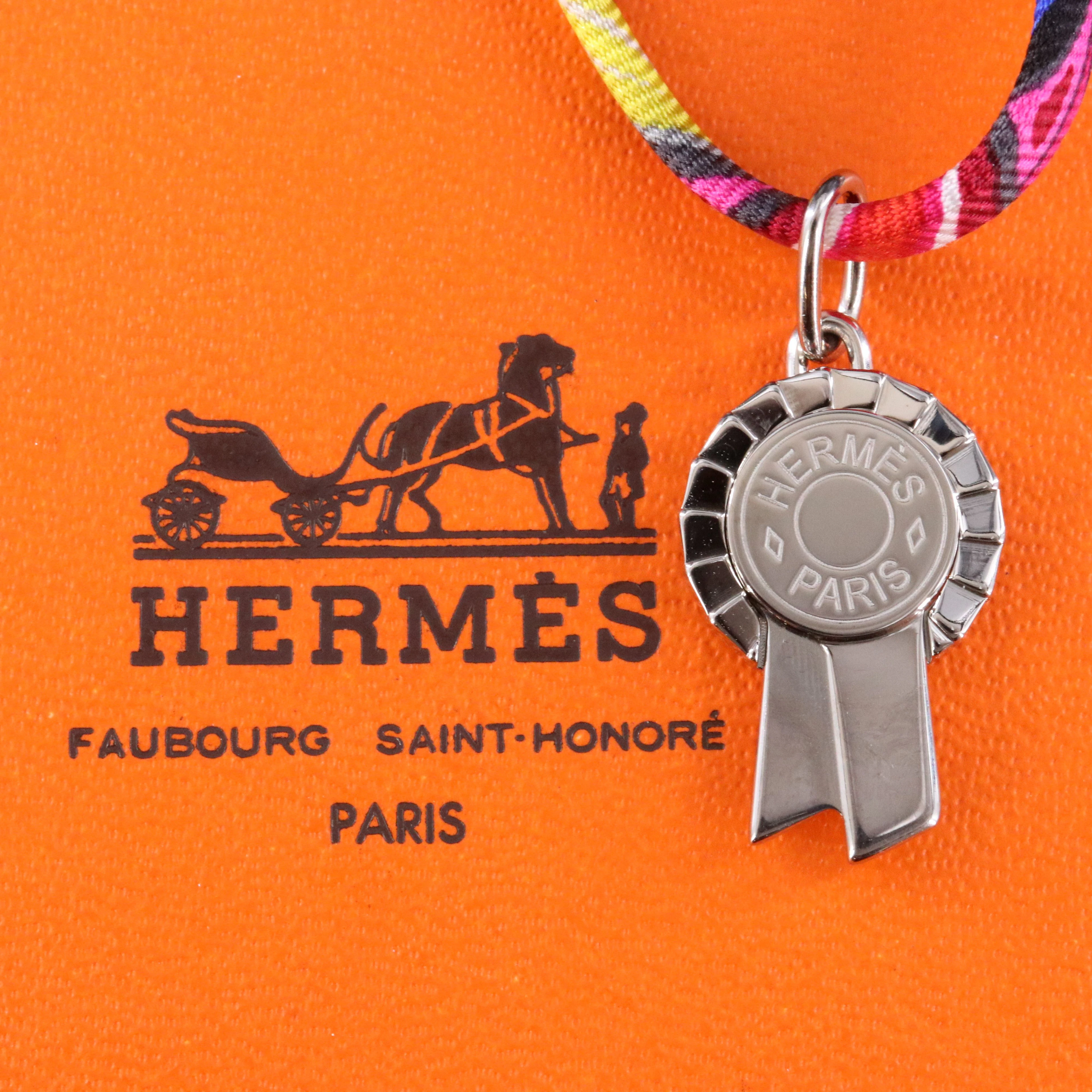 Hermès Tourbillon Silver Tone Charm on Silk Cord Necklace