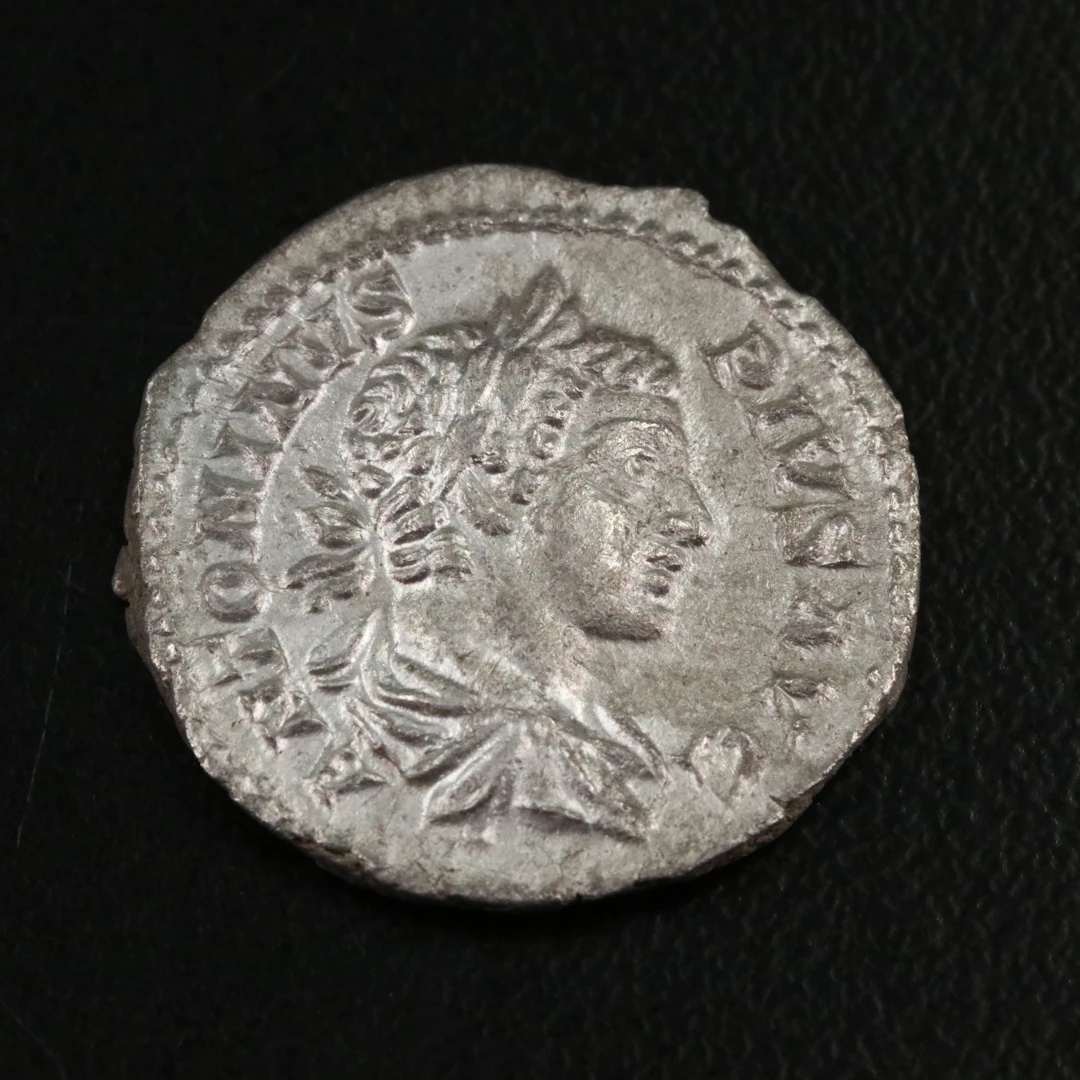 Ancient Roman Imperial AR Denarius Coin of Caracalla, ca. 205 A.D.