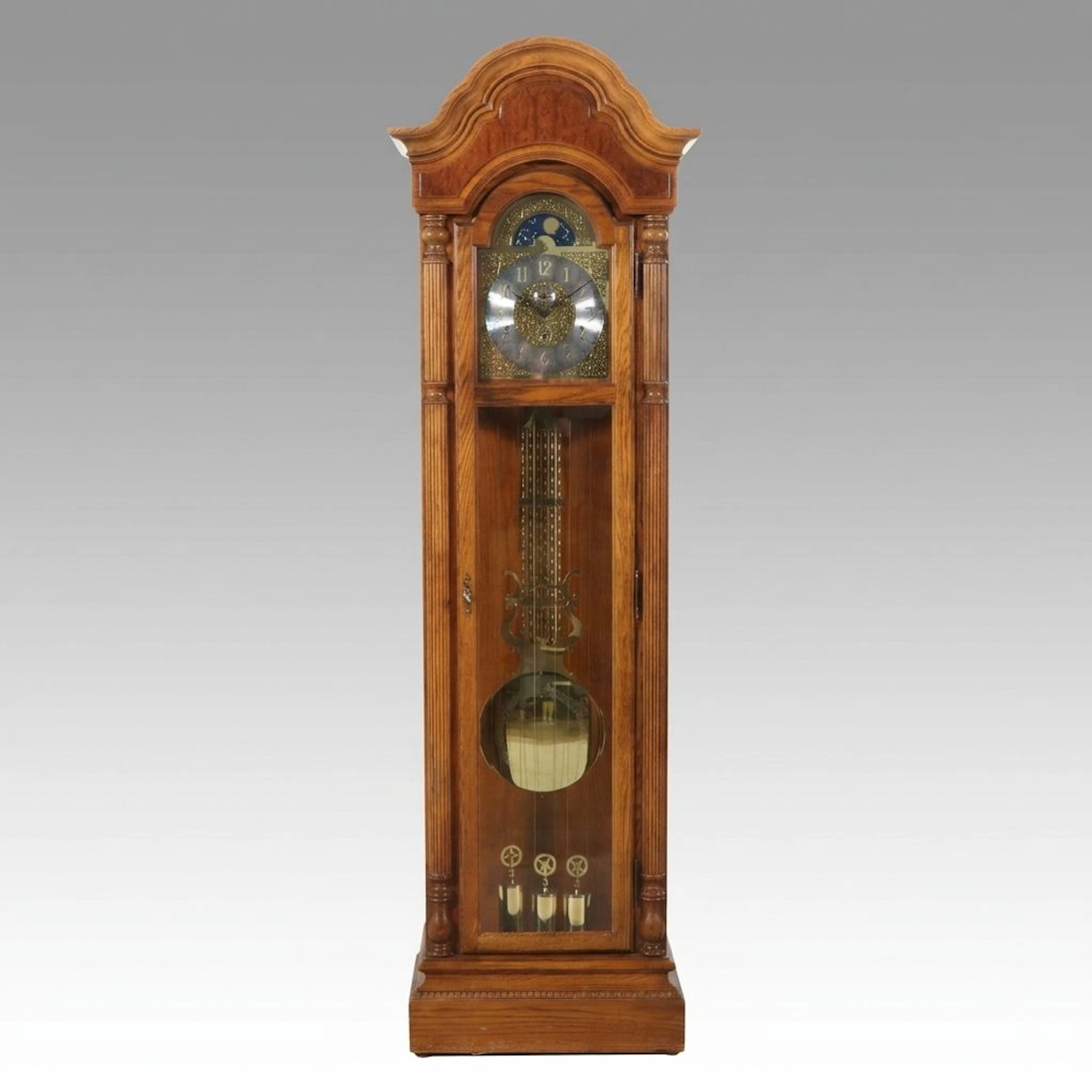 Howard Miller Oak Grandfather Clock with Astronomical Phase Dial