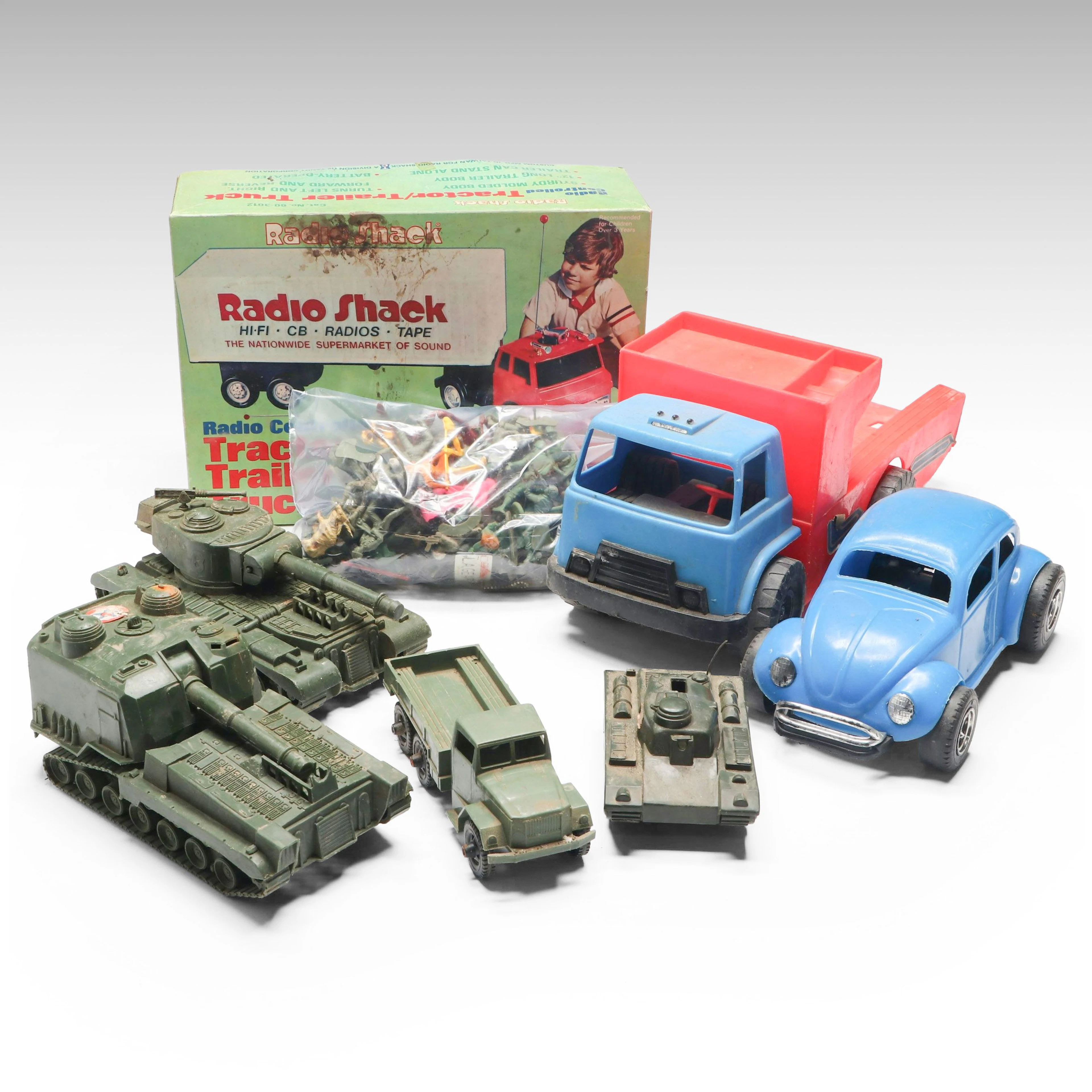 Radio Shack R/C Tractor Trailer Truck with Toy Soldiers and More Cars