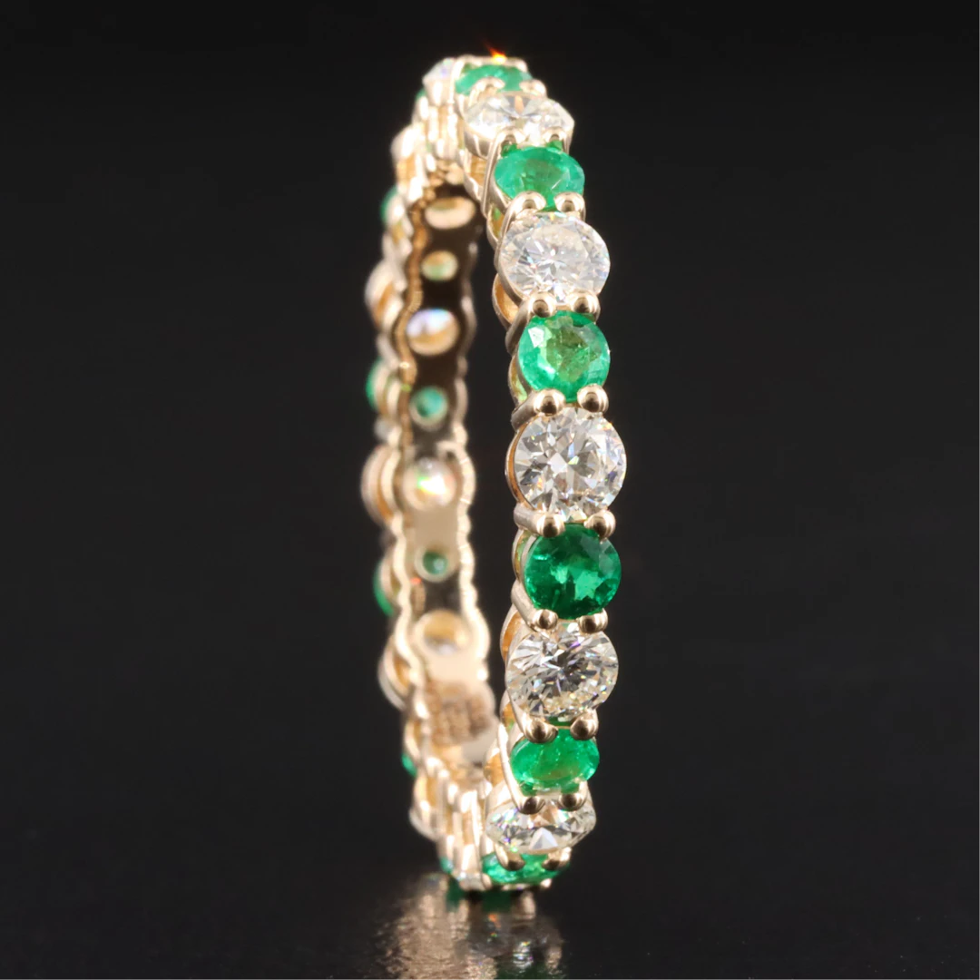 14K 1.32 CTW Diamond and Emerald Eternity Band