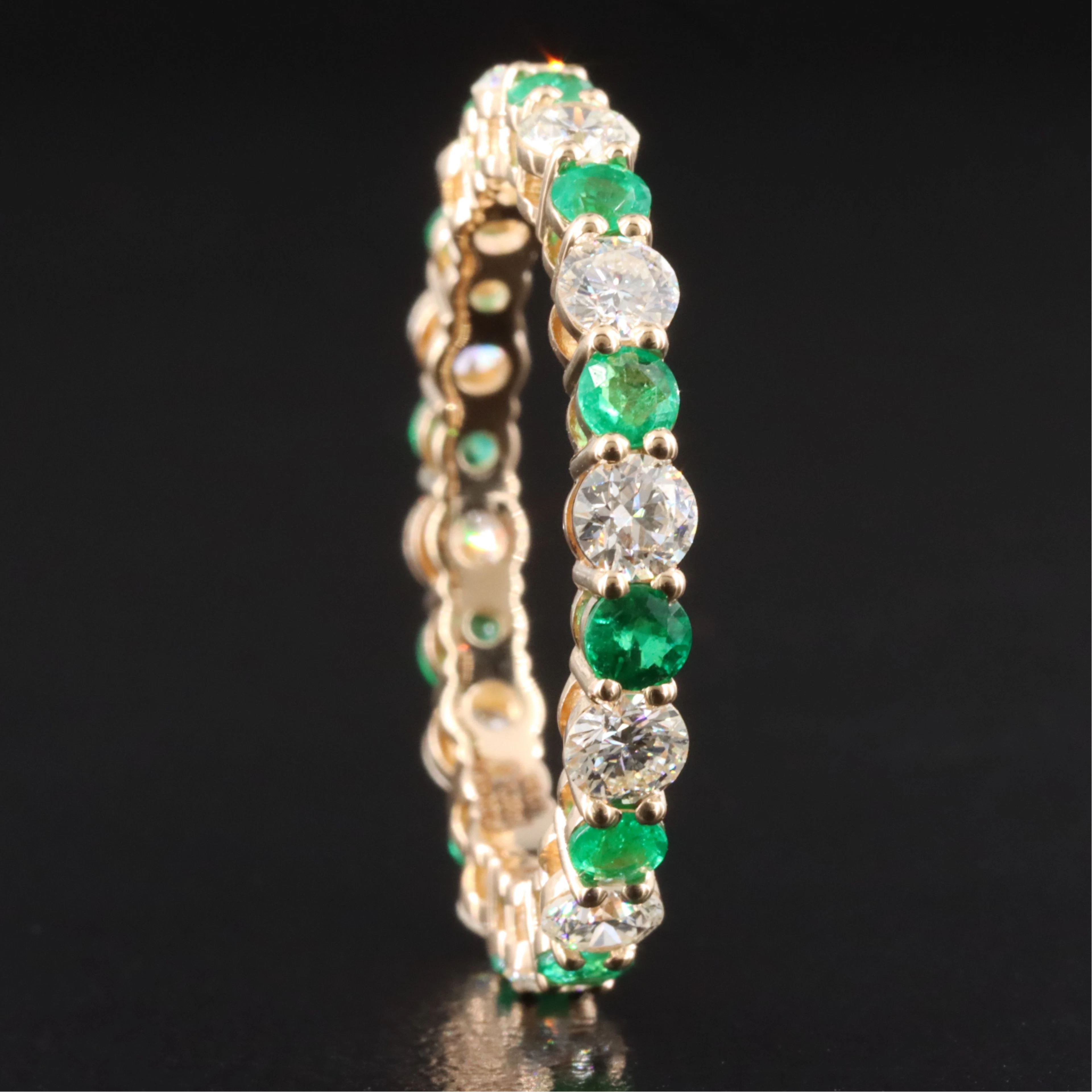 14K 1.32 CTW Diamond and Emerald Eternity Band