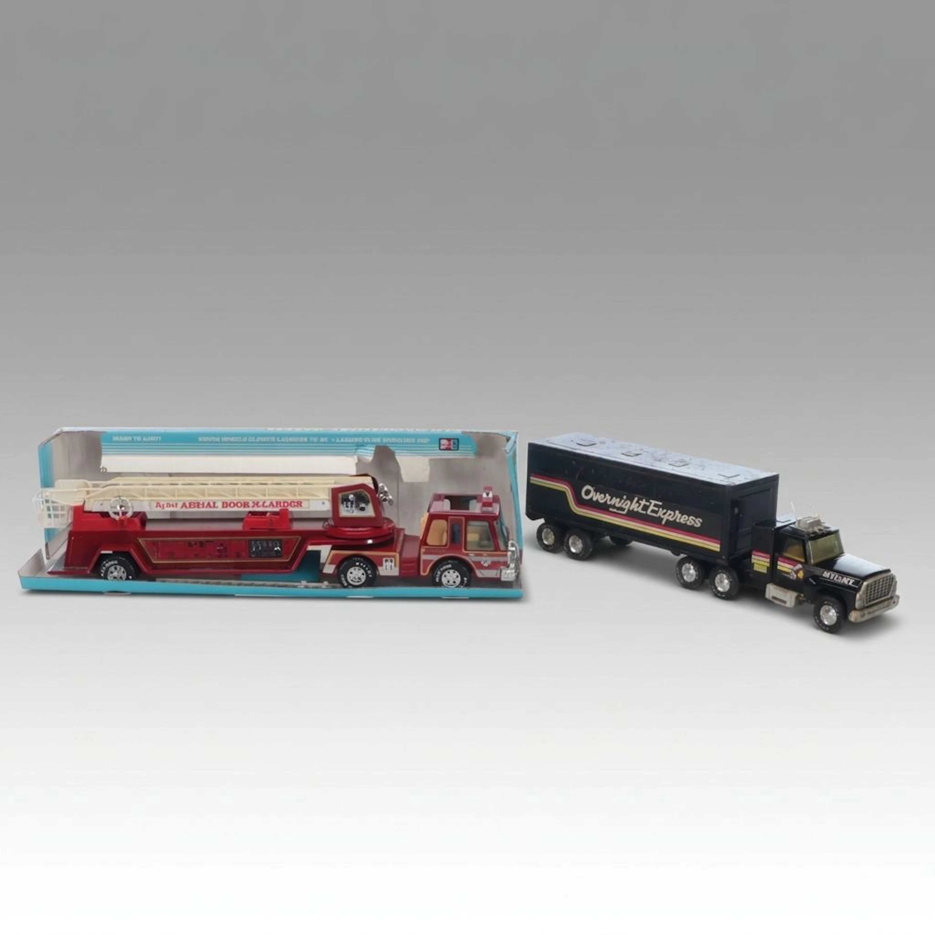 Nylint Pressed Steel Toy Fire Truck and Semi Truck, Late 20th Century