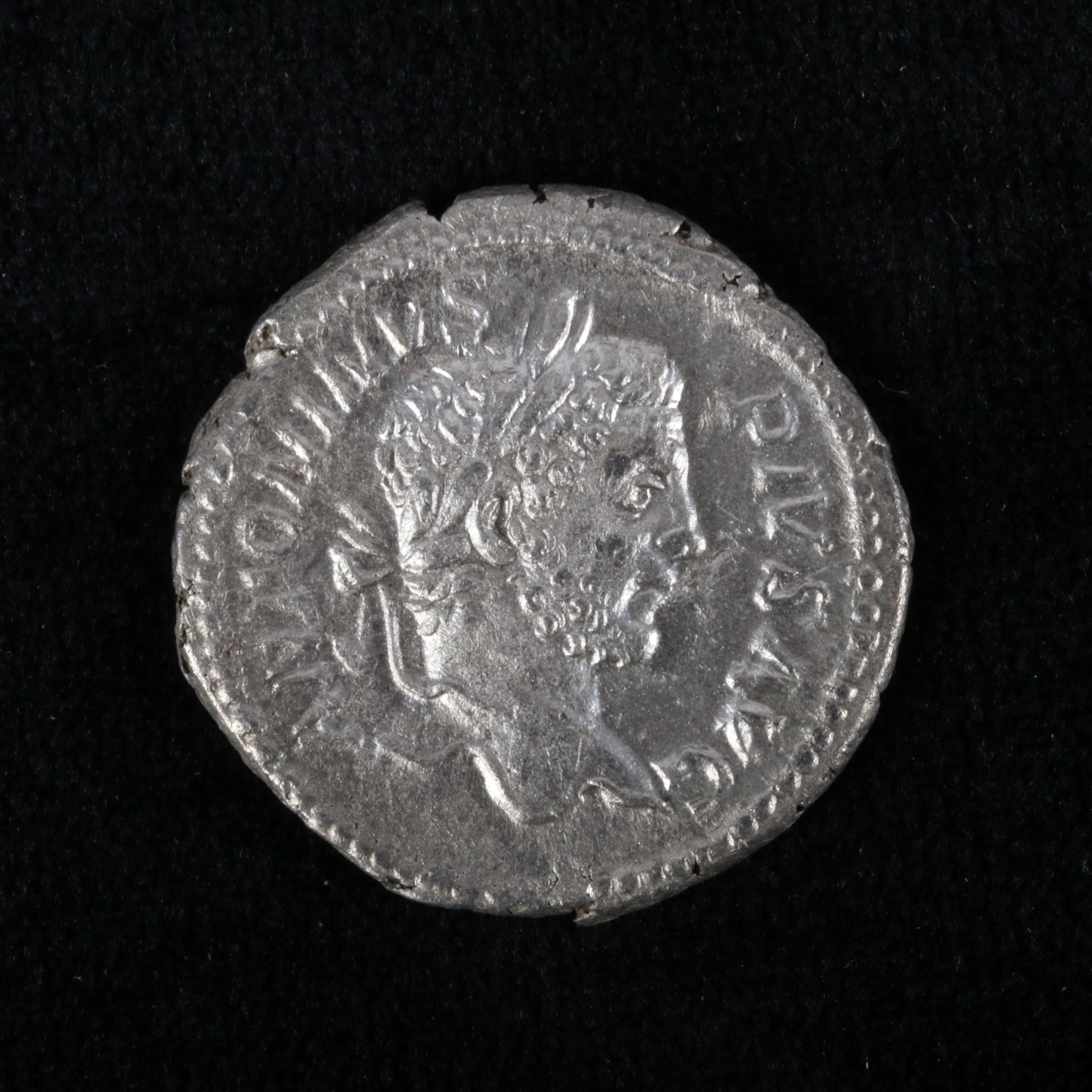 Ancient Roman Imperial AR Denarius Coin of Caracalla, ca. 210 A.D.