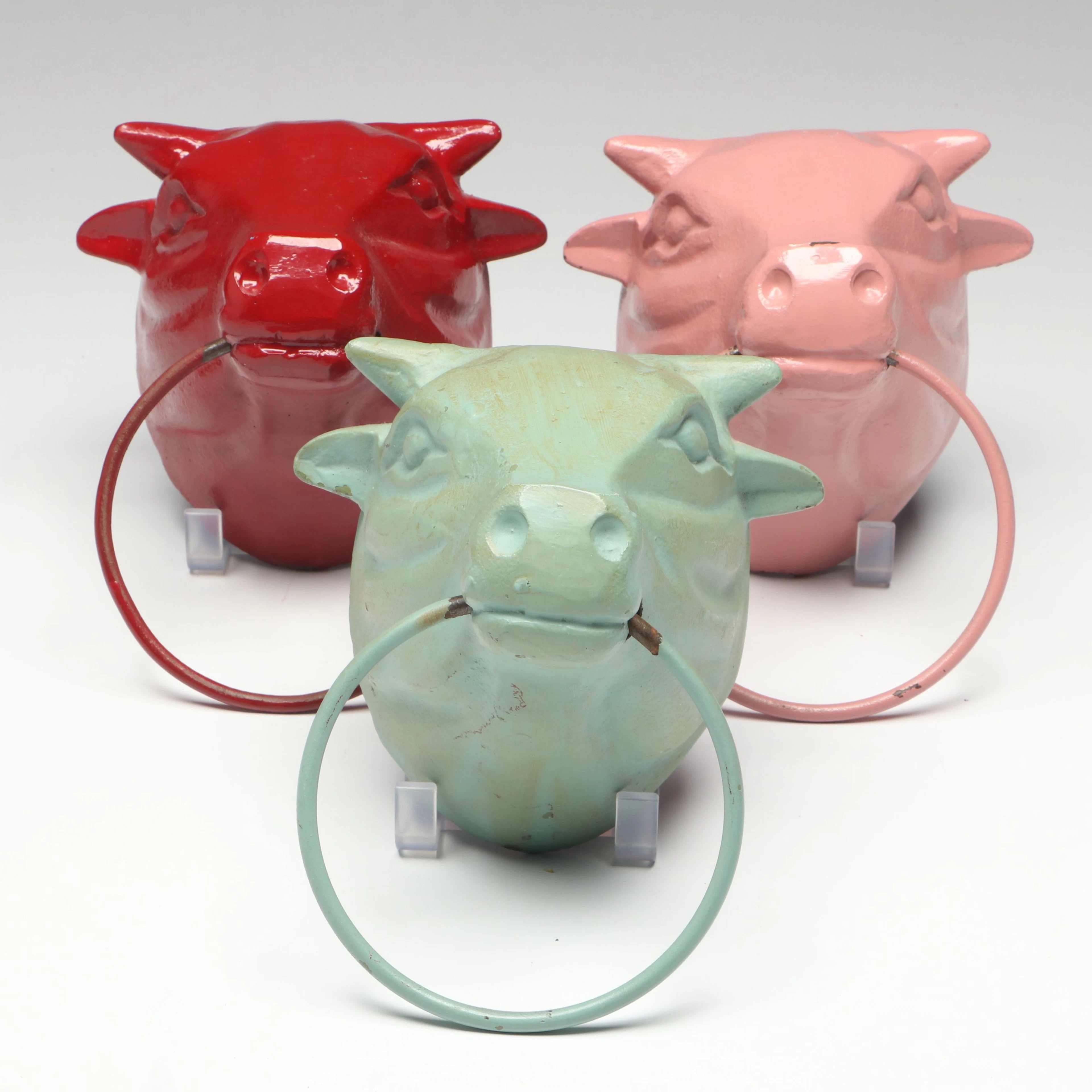 Red, Pin and Green Cast Iron Cow Head Wall Rings