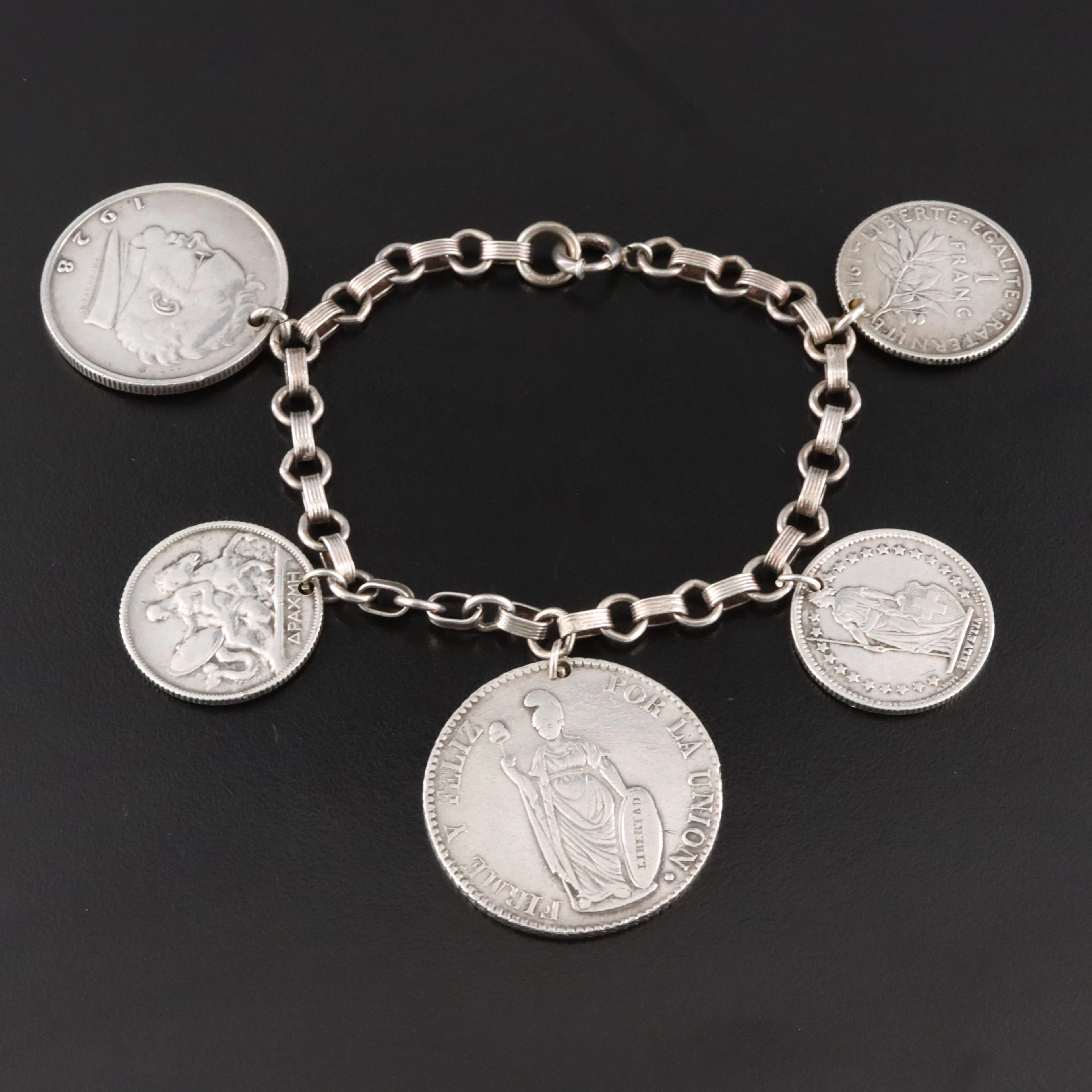 Sterling Coin Bracelet Including 1843 Peru 4 Reales & 1910 Greece Drachma