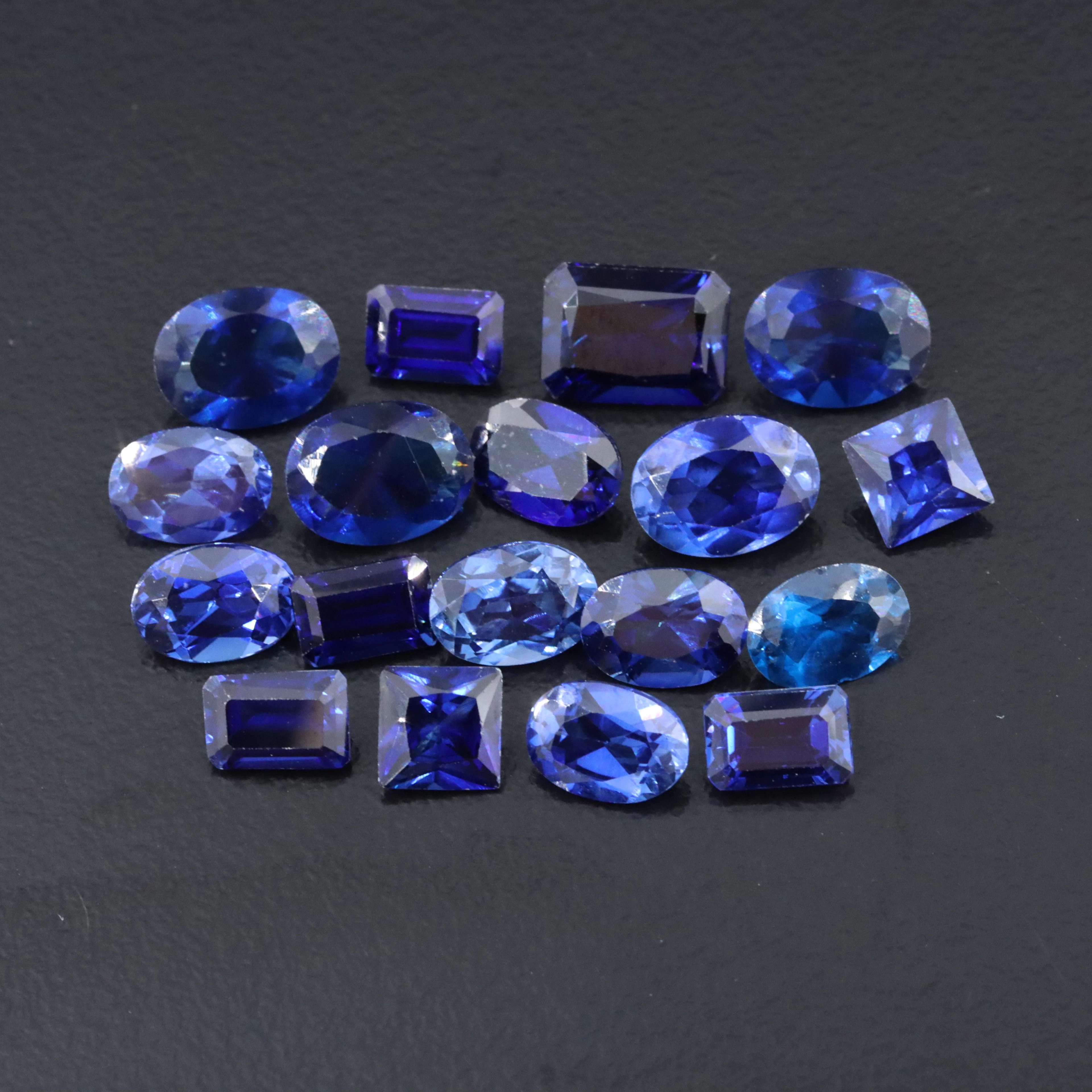 Loose 18.32 CTW Gemstone Lot Including Lab Grown Sapphire and Lab Grown Spinel