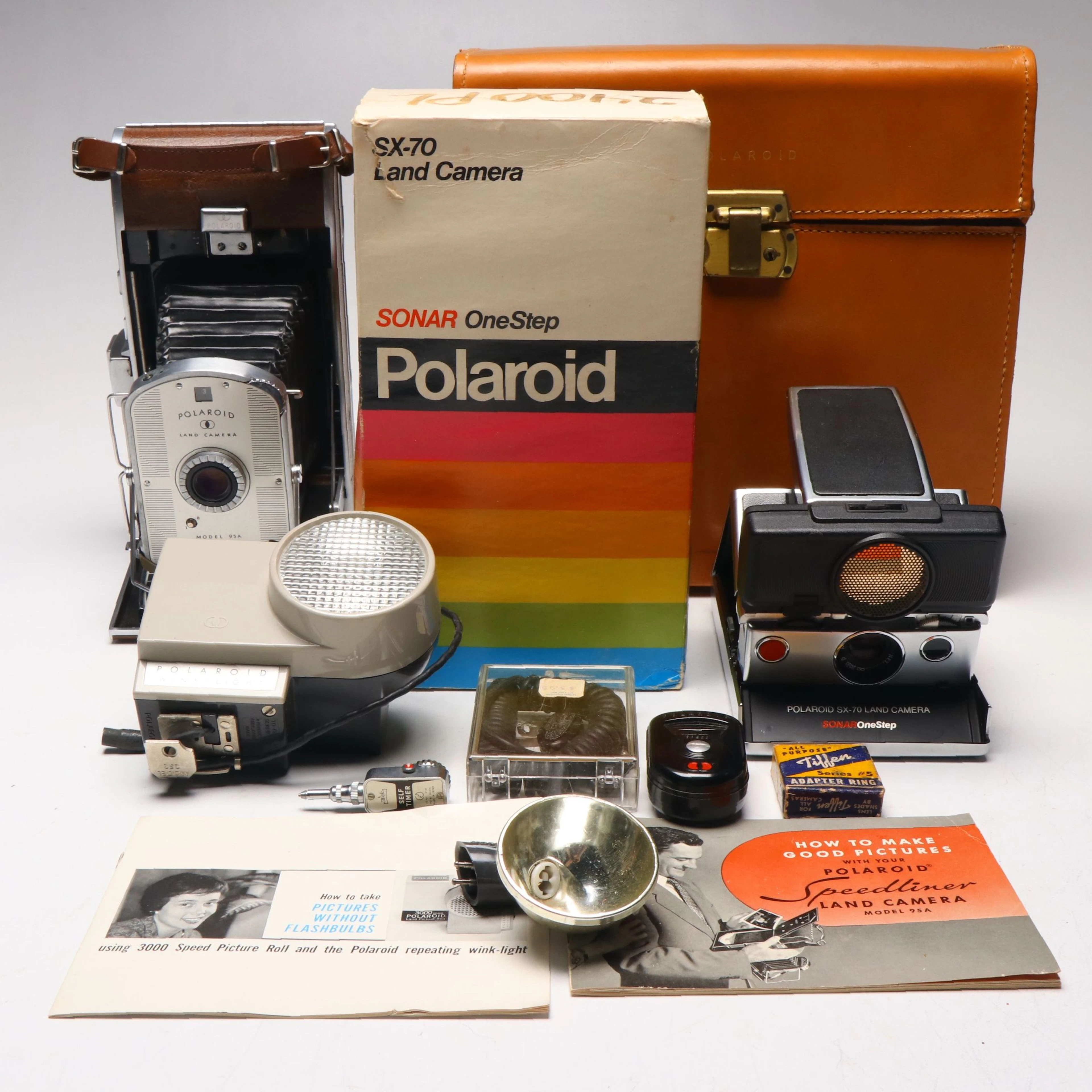 Polaroid Land Camera Models 95A and SX-70 with Accessories, Mid to Late 20th C.