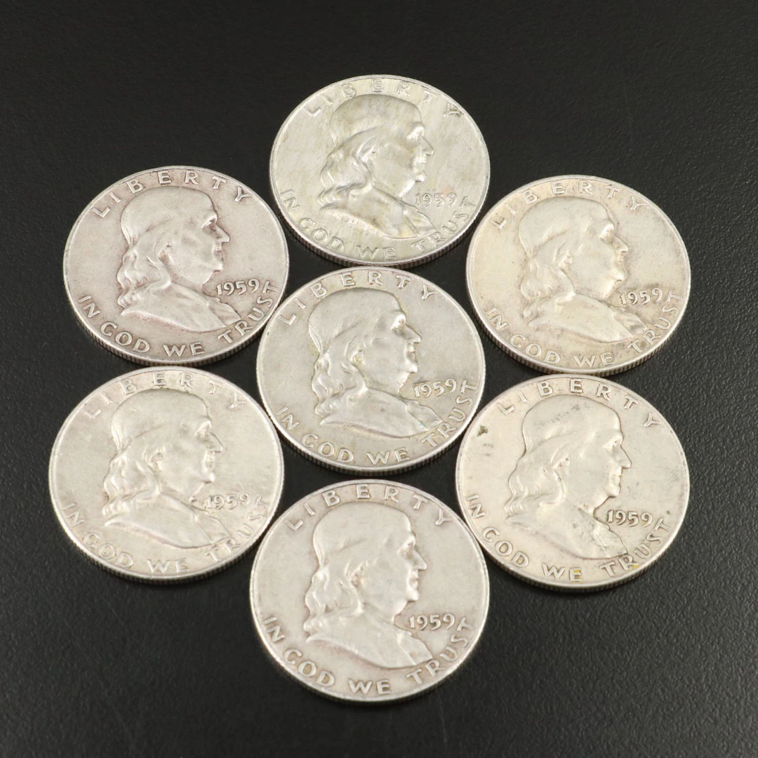 Seven 1959 and 1959-D Franklin Silver Half Dollars