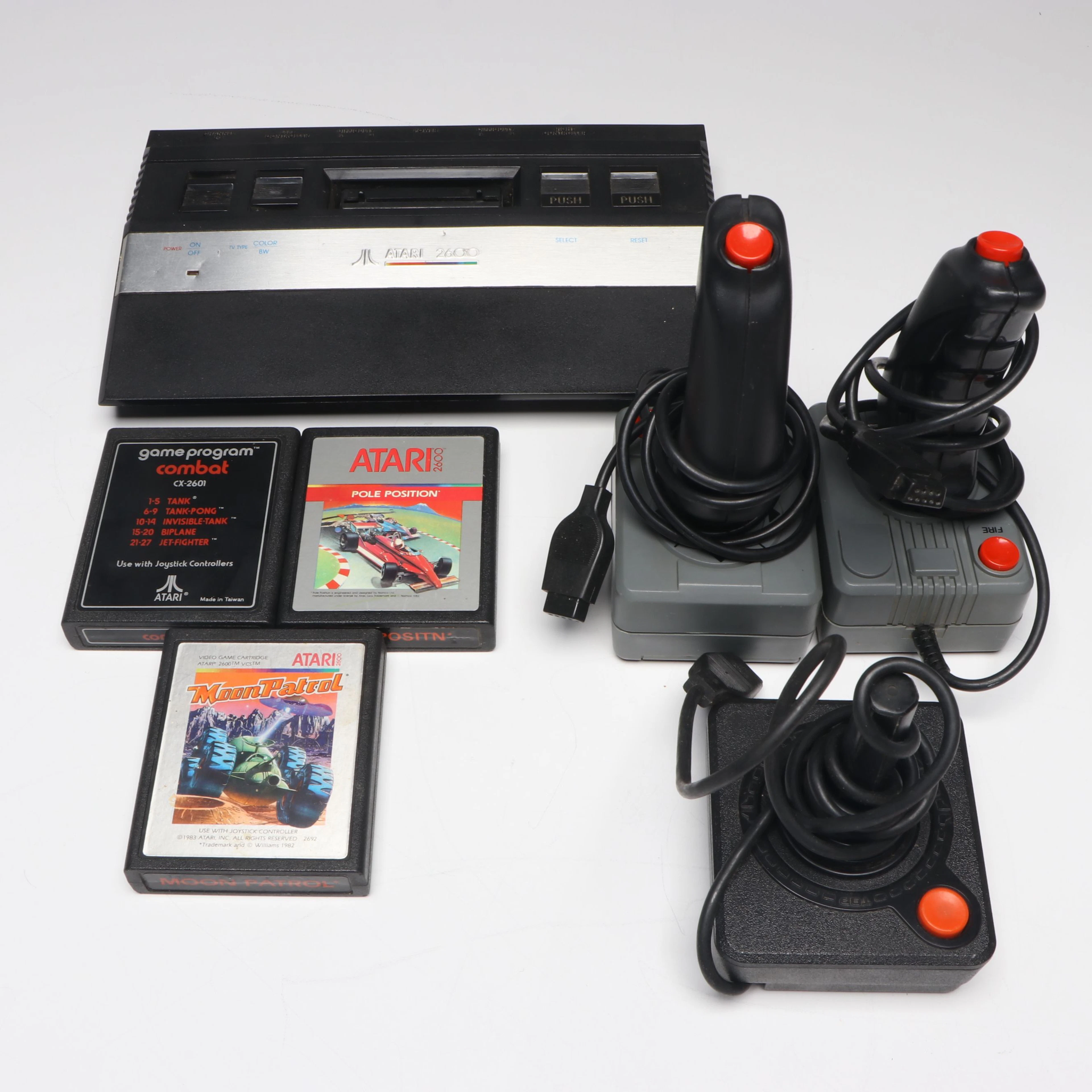 Atari 2600 Video Game Console with Controllers and Games, 1980s