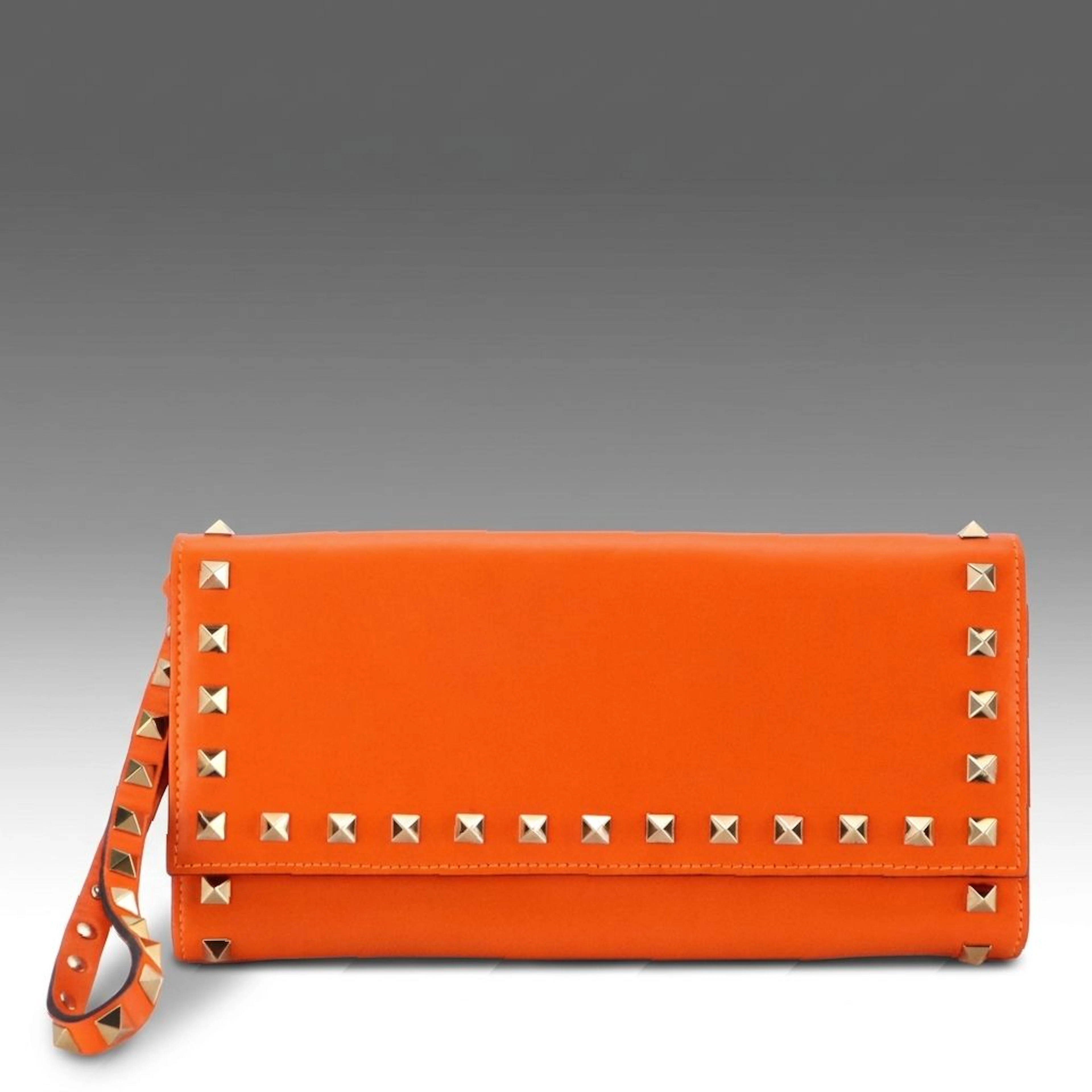 Valentino Garavani Rockstud Clutch Wallet in Orange Calfskin Leather