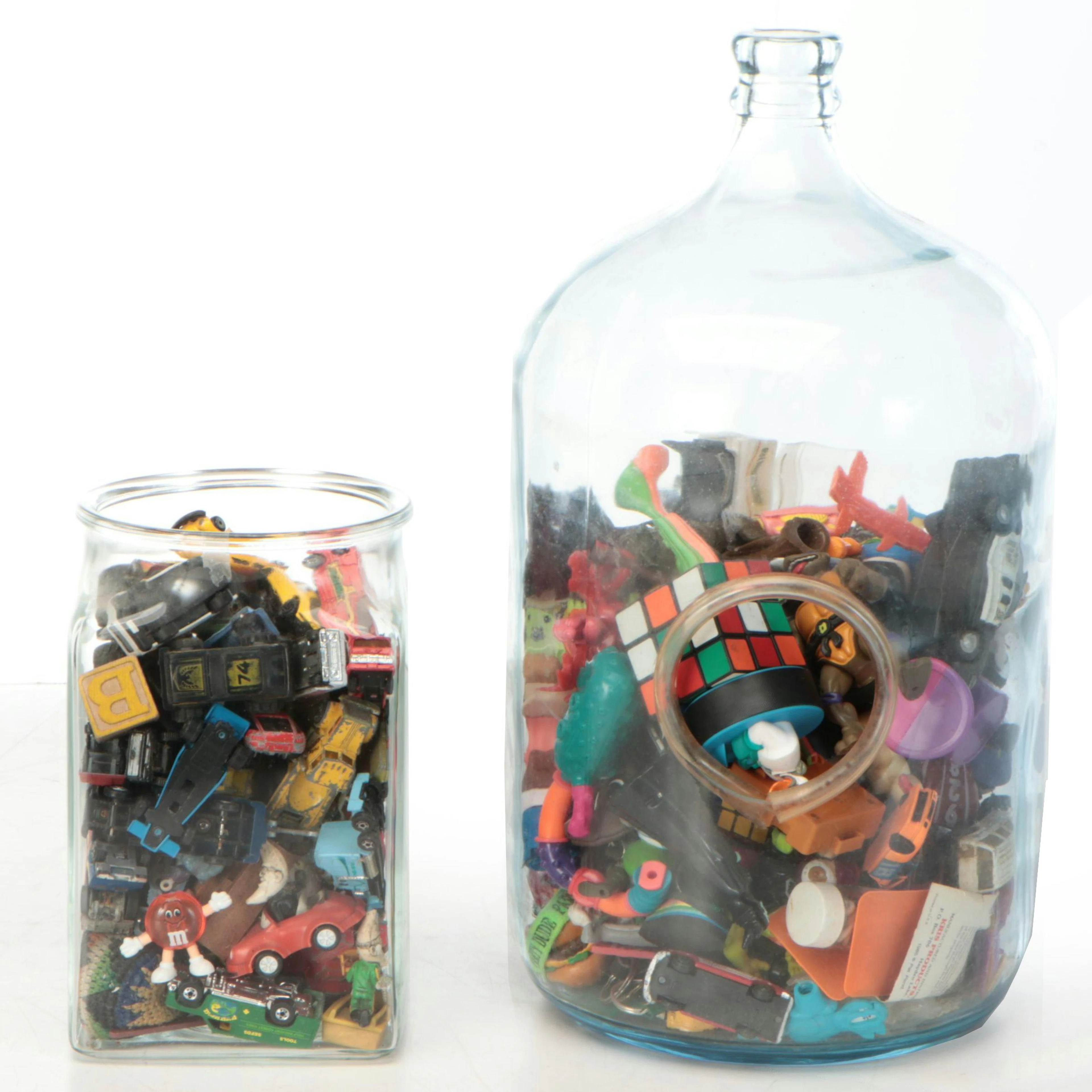 Glass Jars with Dinky Toys, Action Figures, Rubik's Cube and More