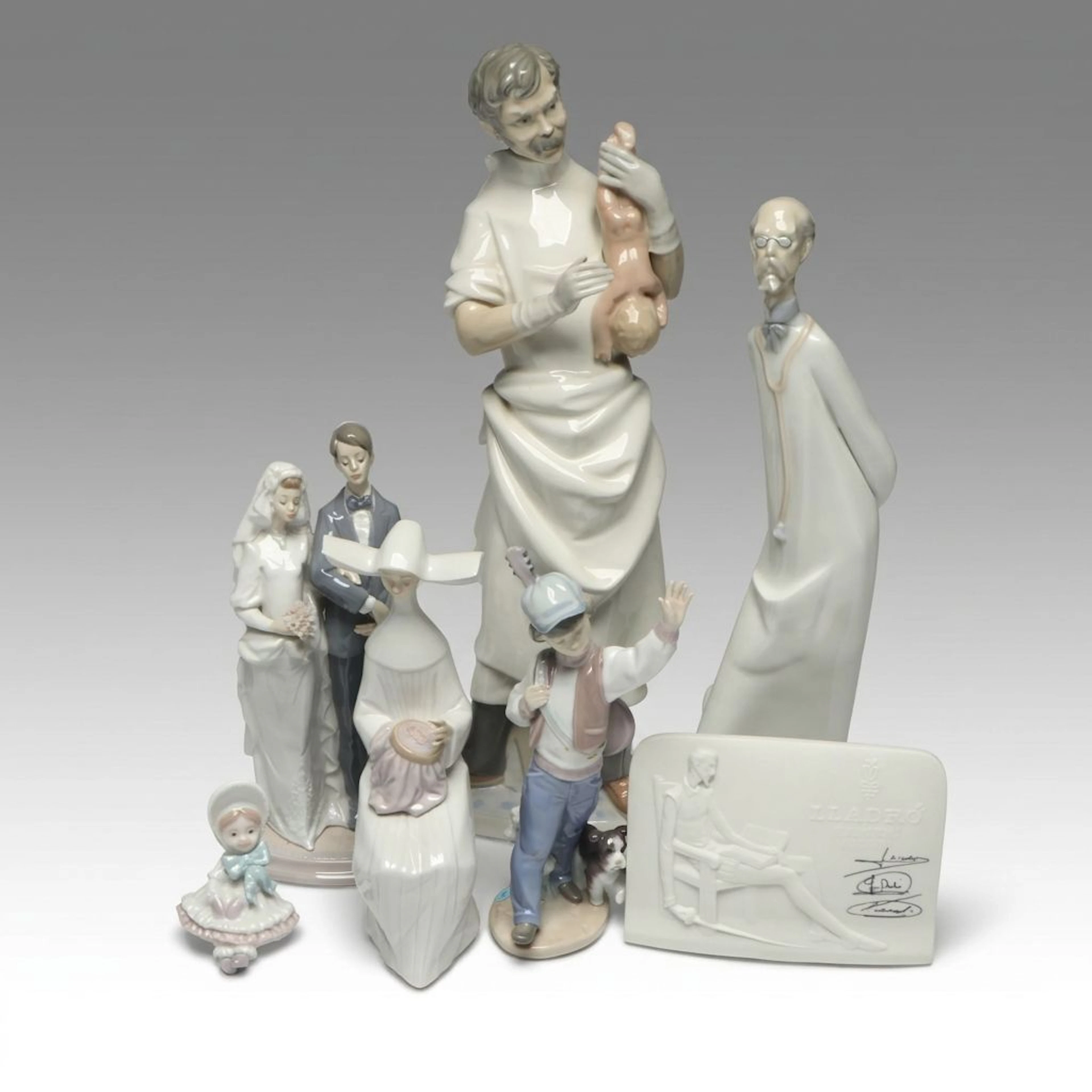 Lladró Porcelain "Obstetrician" with Other Figurines and Plaque