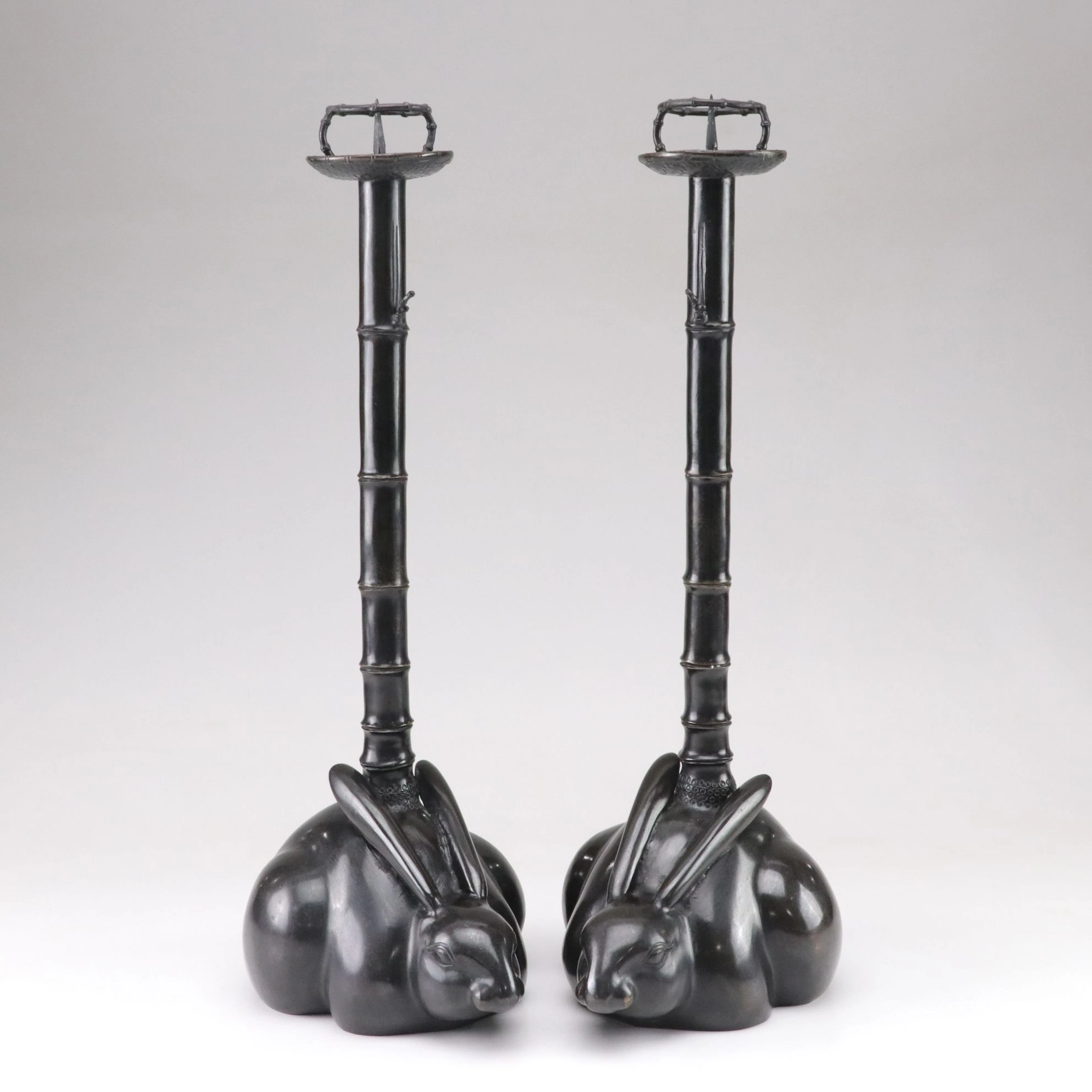 Pair of Taisho Style Black Patinated Bamboo Crouching Rabbit Candlesticks