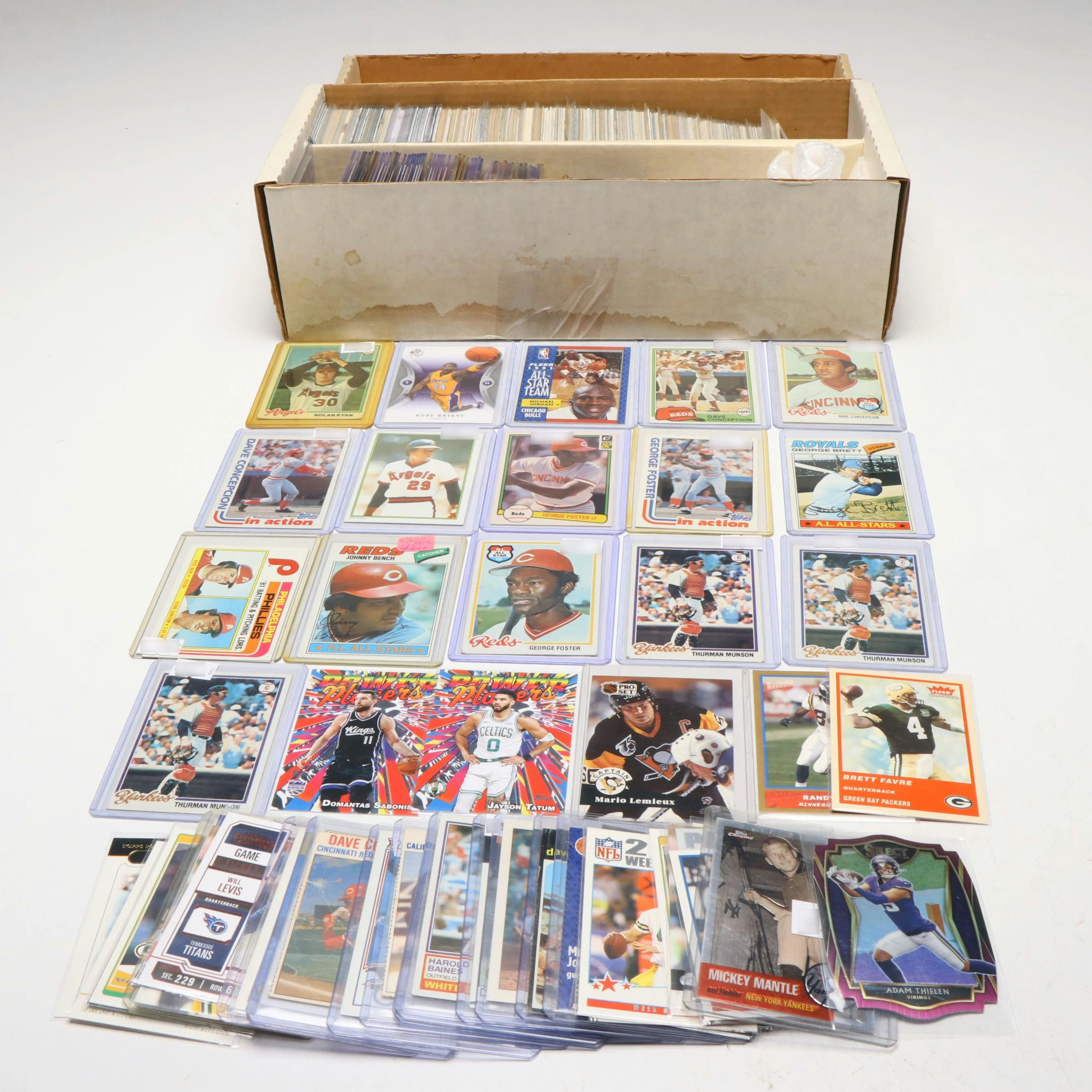 Topps with Other Sports Cards Featuring Nolan Ryan, Brett Favre, and More