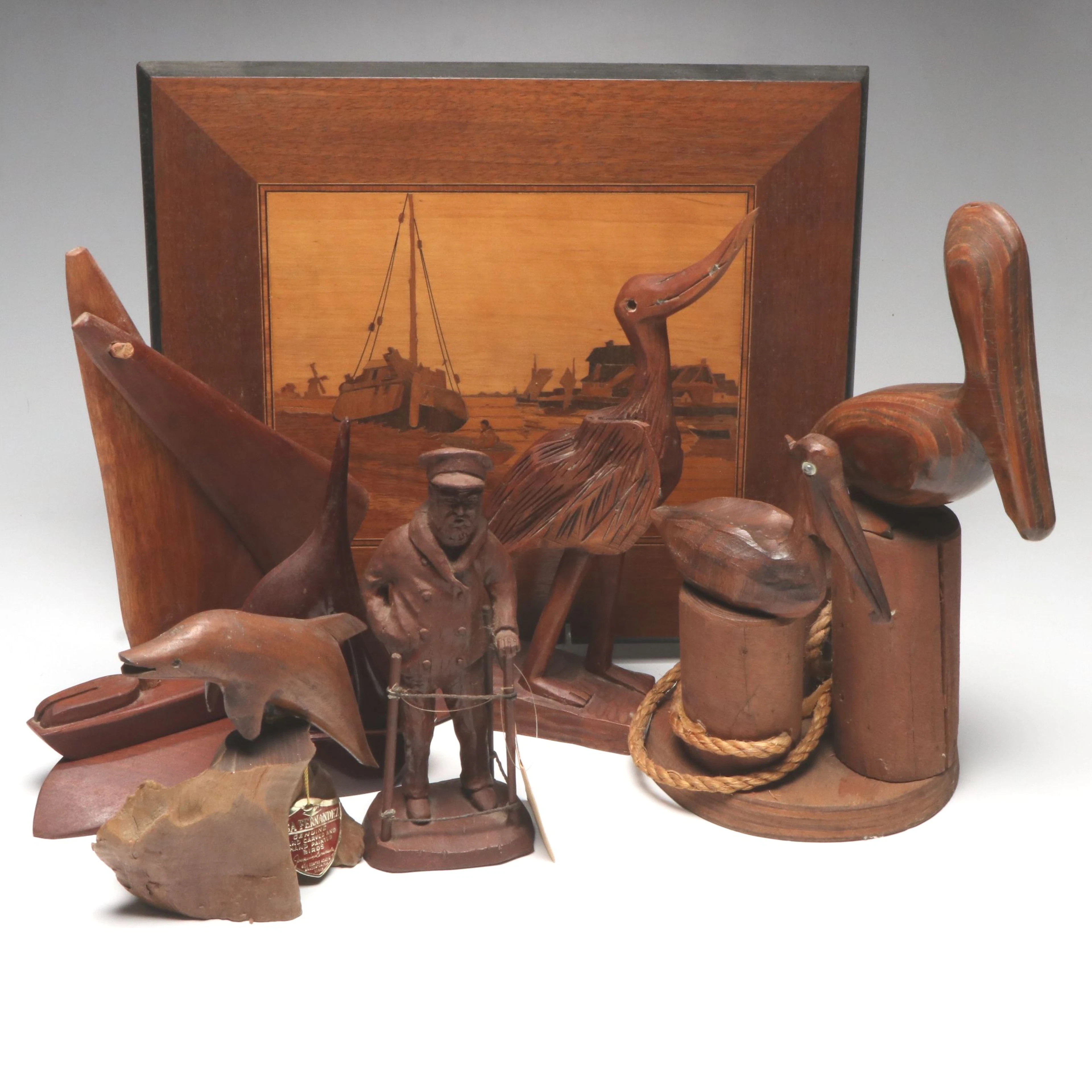 Carved Wood Pelicans, Dolphin, and More Figurines with Inlaid Wood Wall Art