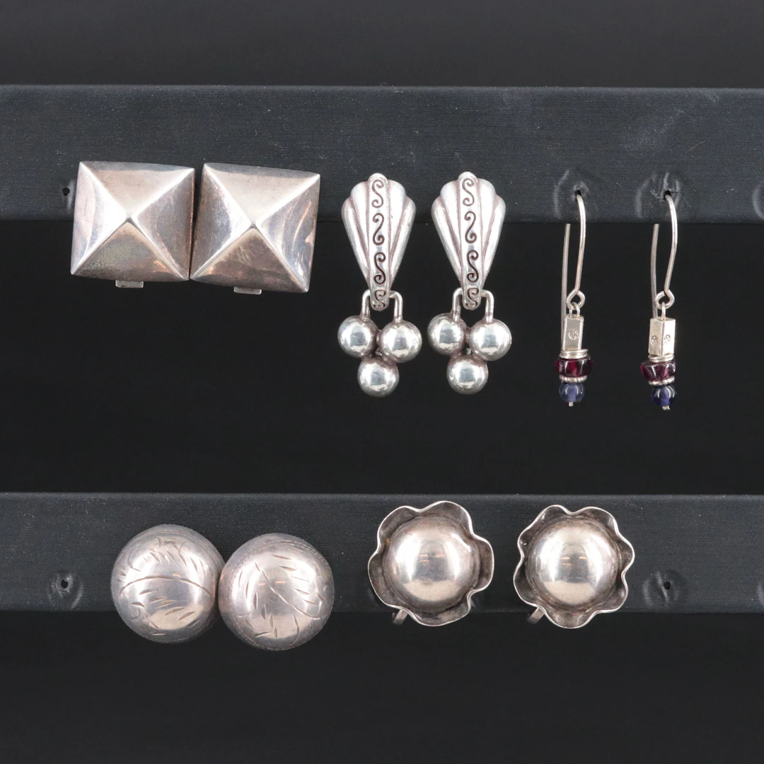 Sterling, Garnet and Iolite Featured in Earring Collection