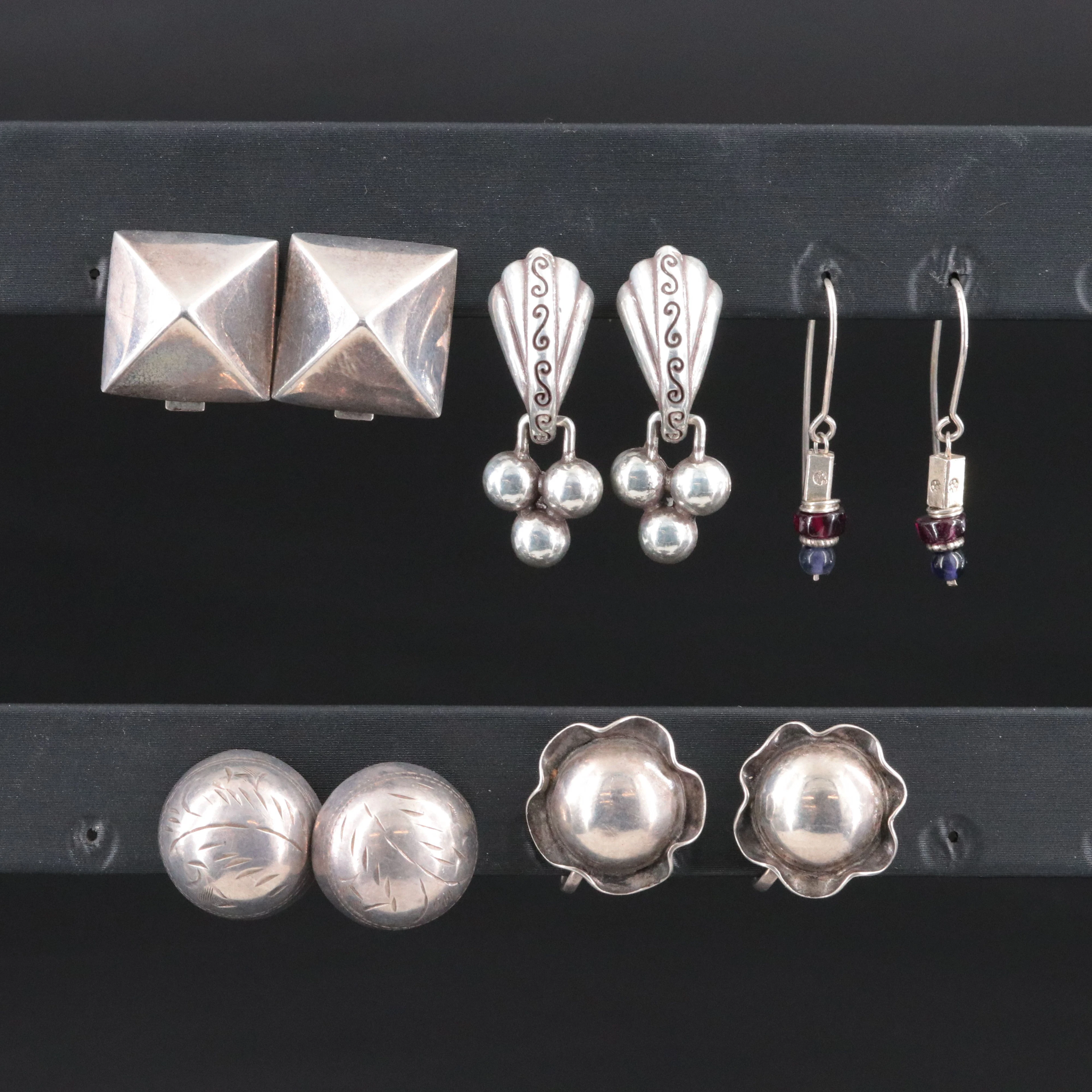 Sterling, Garnet and Iolite Featured in Earring Collection