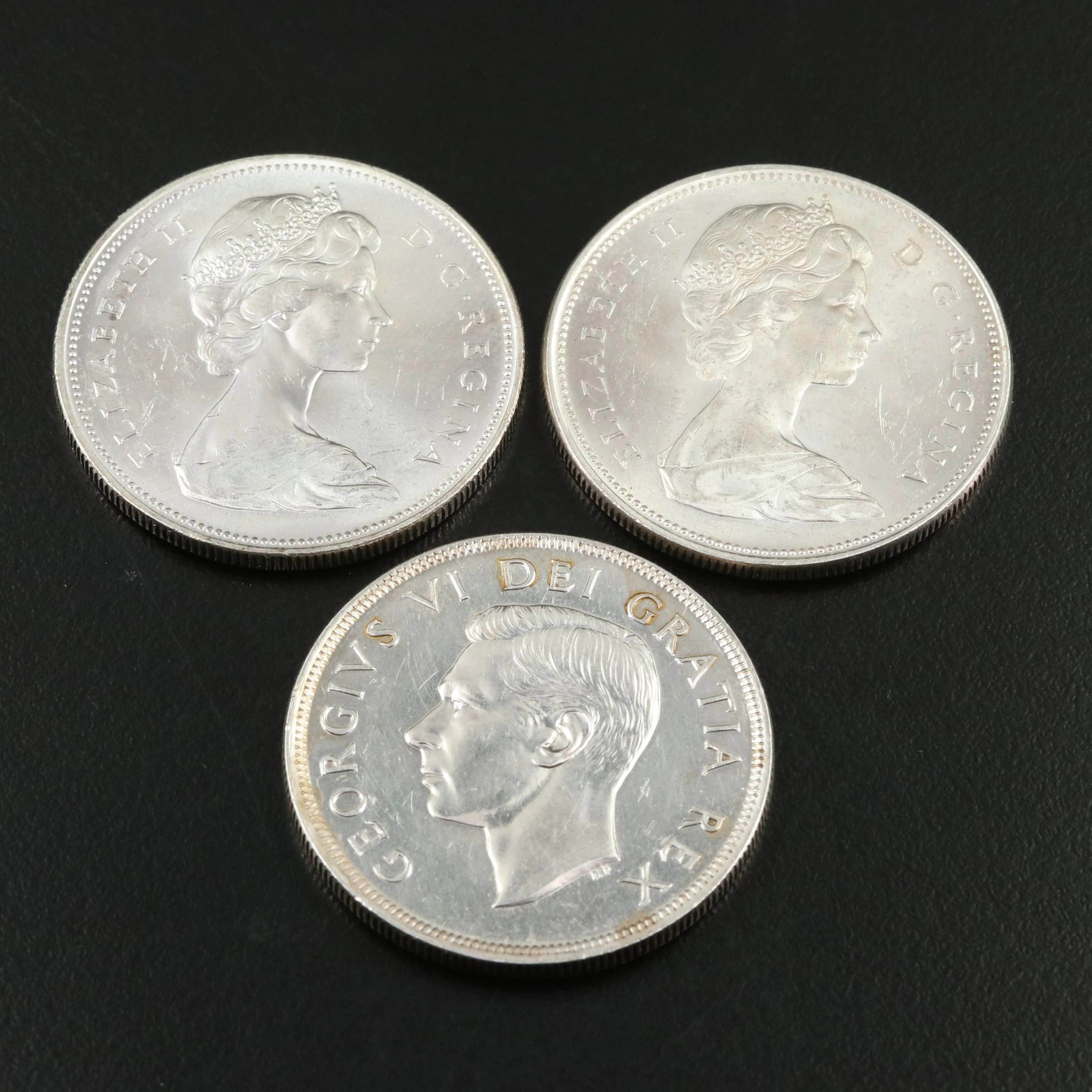 Three Different Canada Silver Dollars