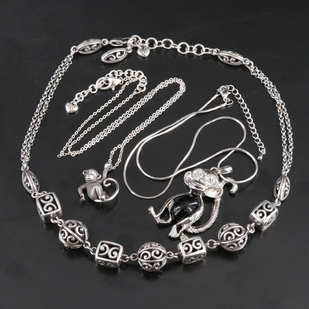 Monkey and Scroll Motif Necklaces Featuring Brighton