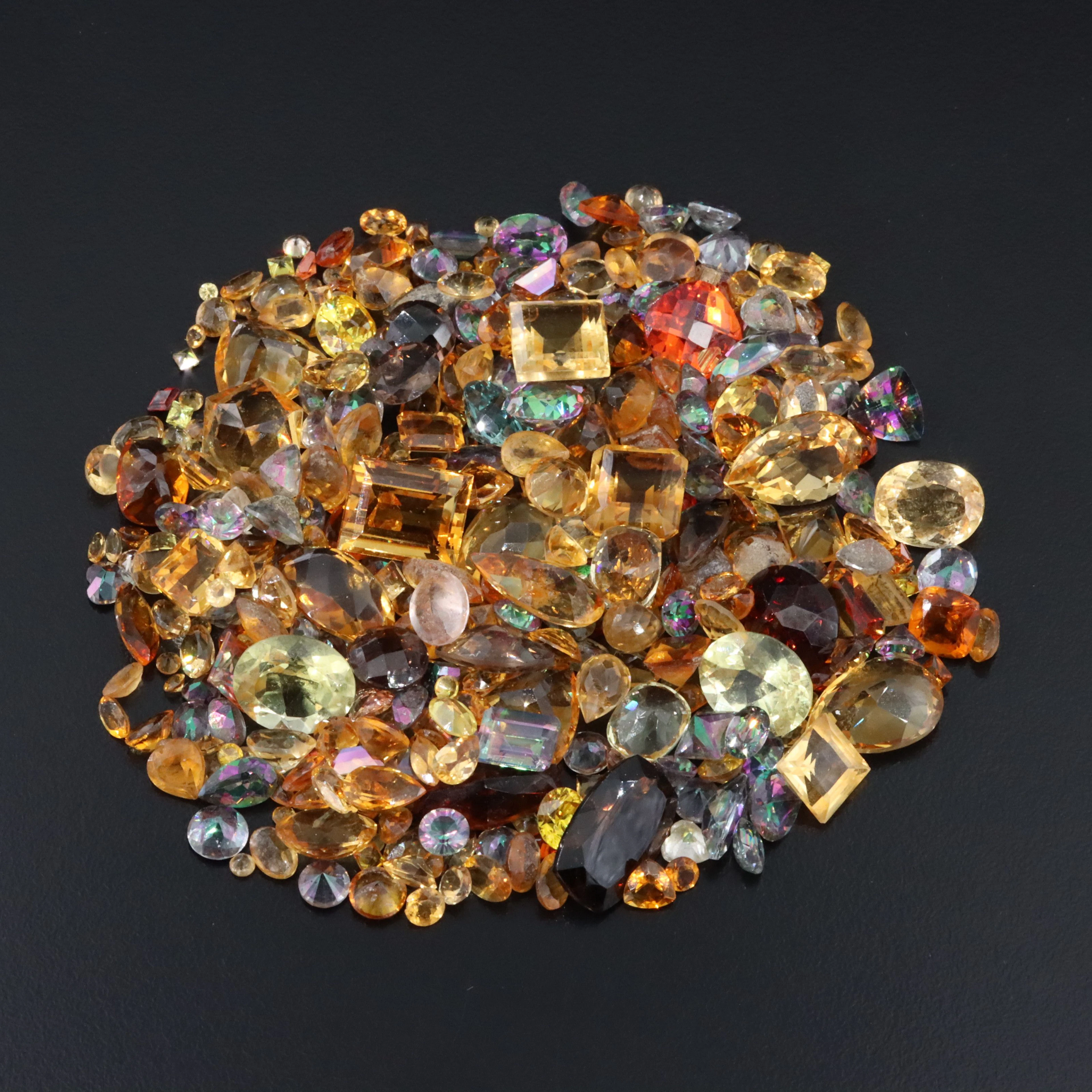 Loose 284.50 CTW Gemstone Lot Including Citrine, Smoky Quartz and Garnet