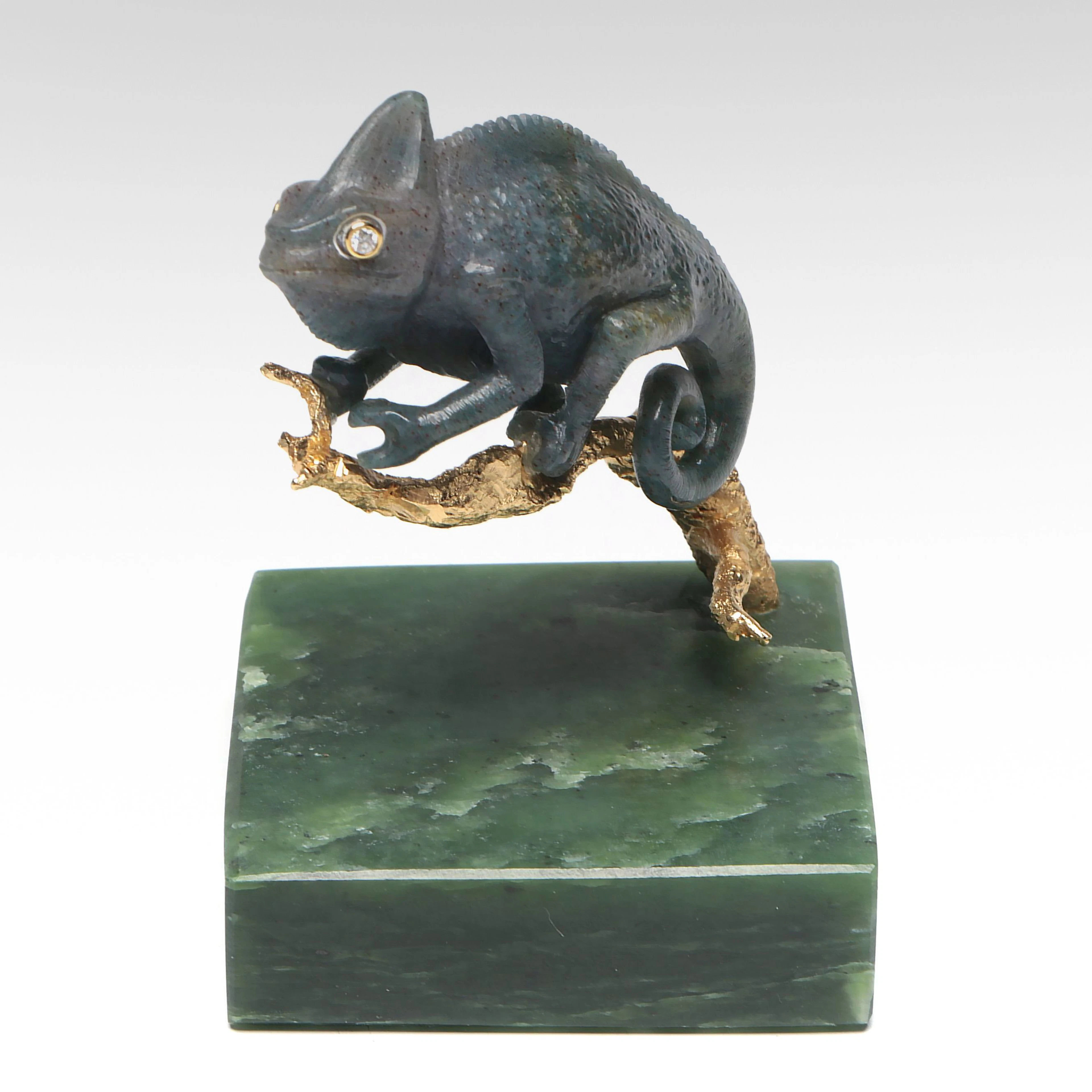 Carved Chalcedony Chameleon with Diamond Eyes on Serpentine Base