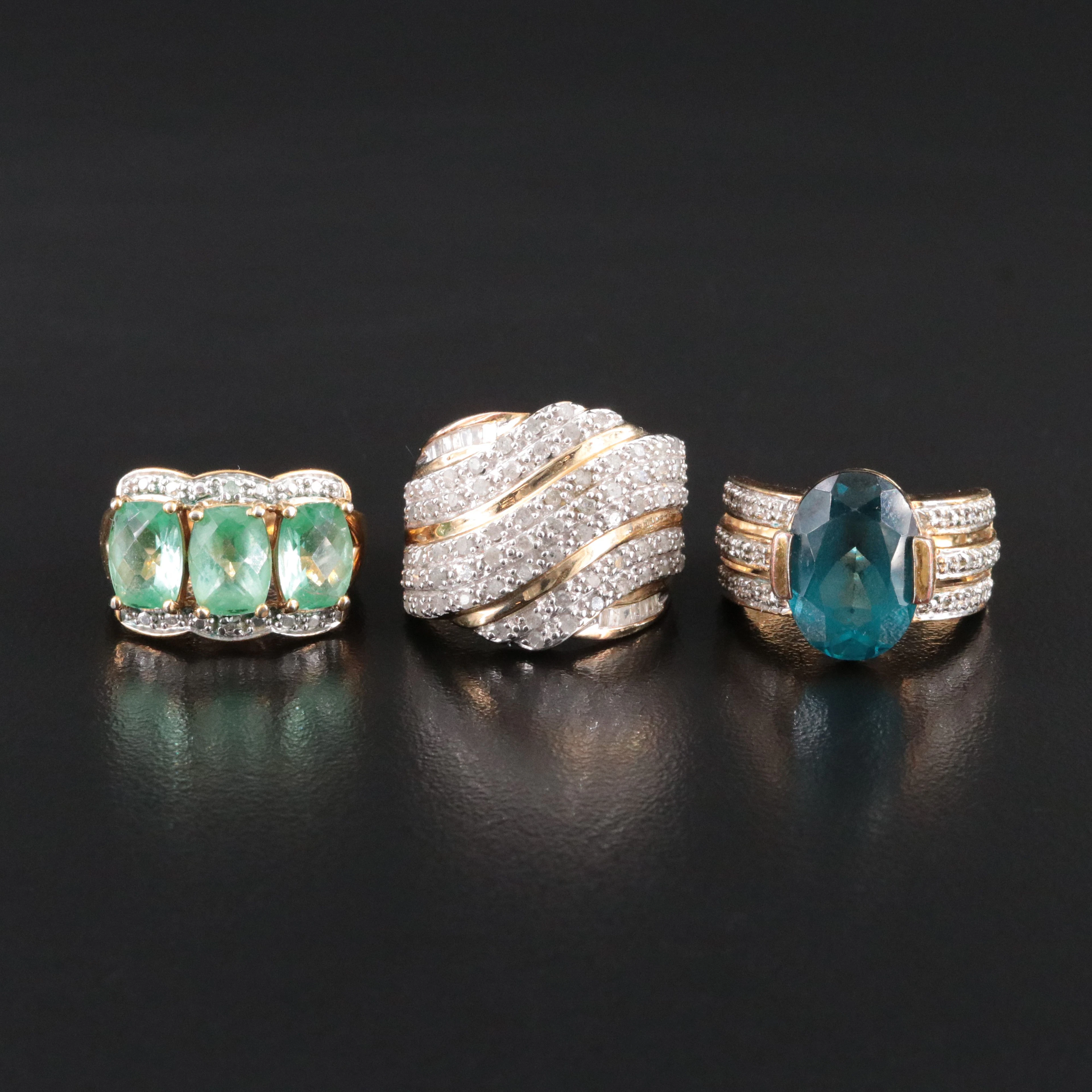 Sterling Rings Featuring Blue Topaz and Diamond Accents