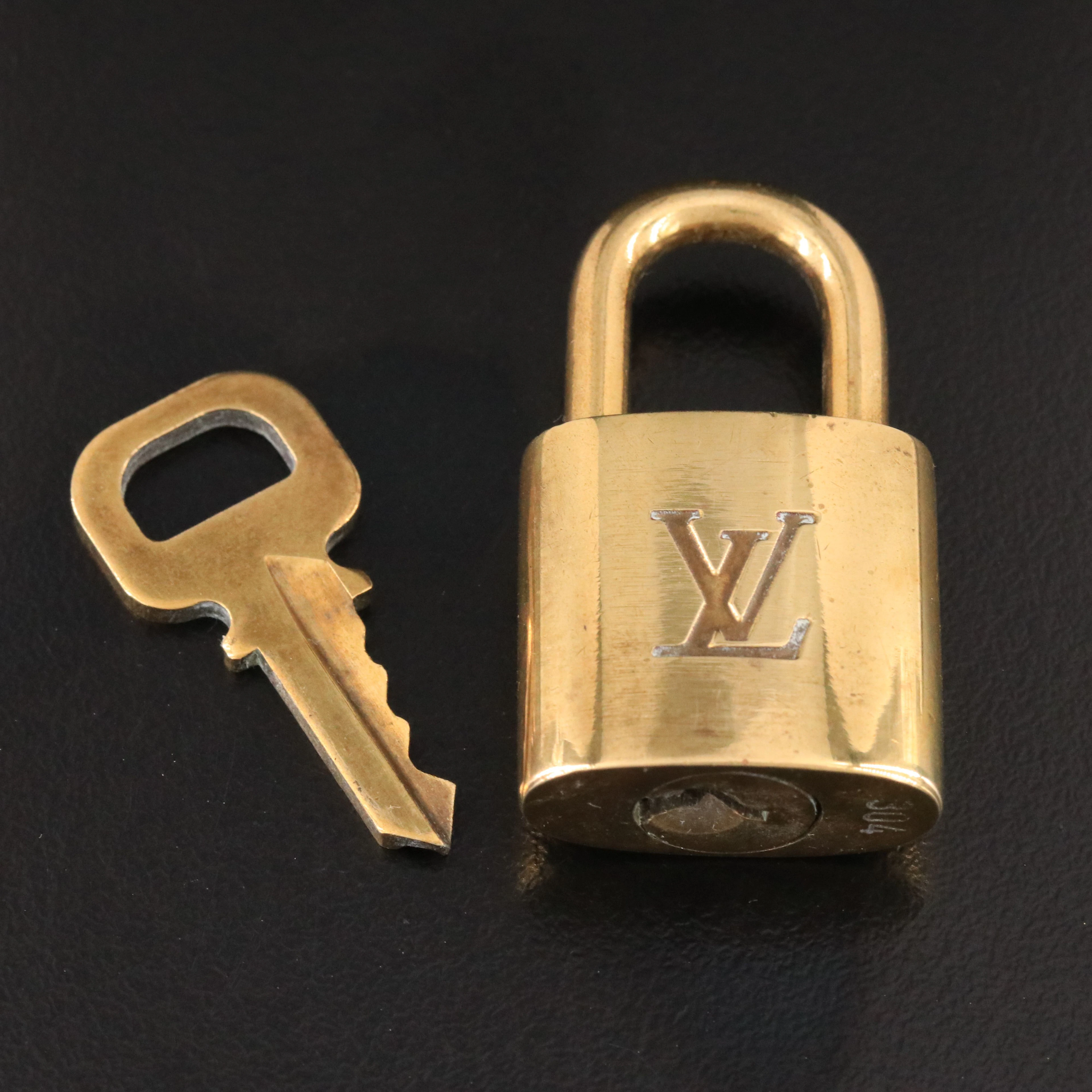 Louis Vuitton Brass Luggage Padlock and Key