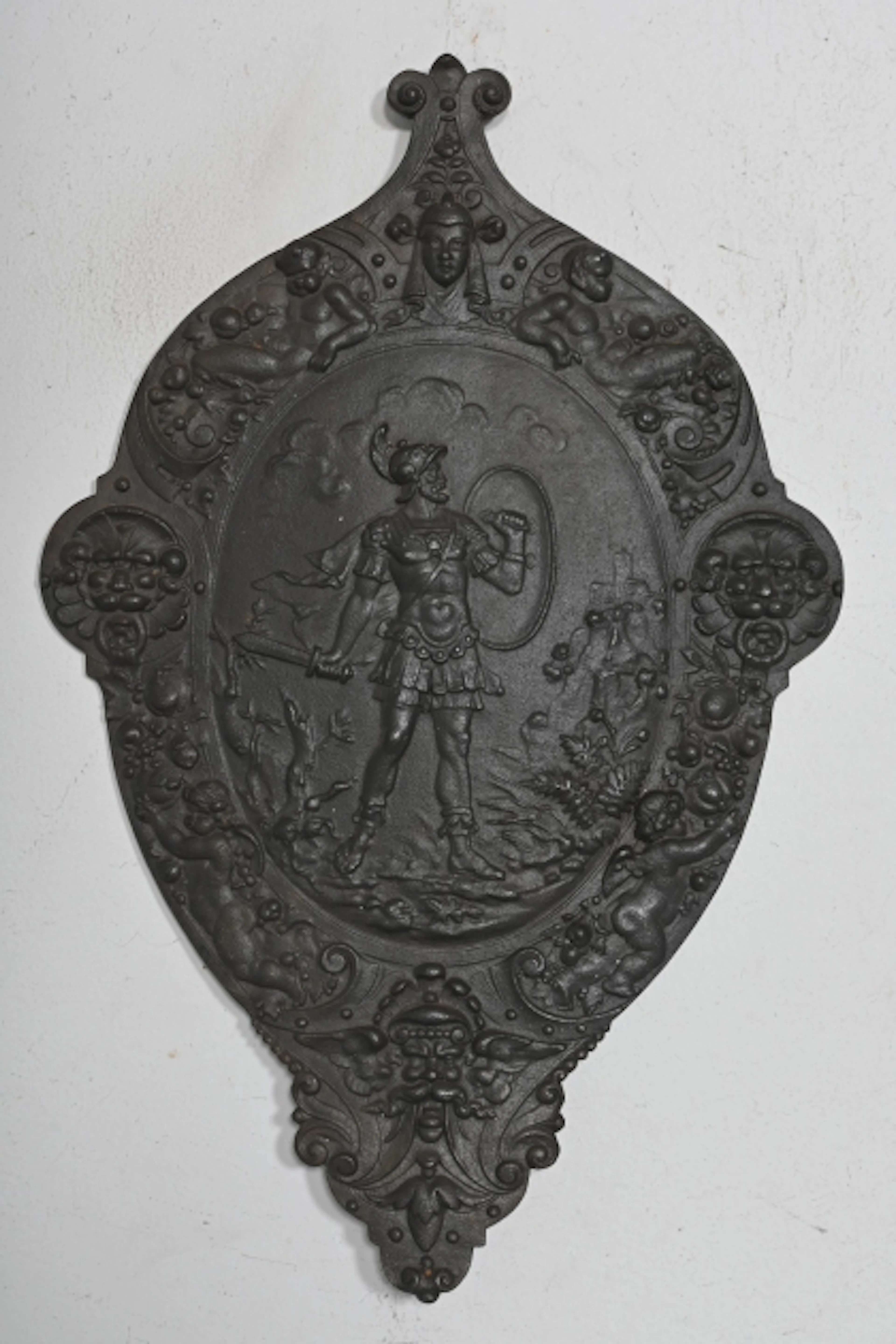 Väggsköld, gjutjärn