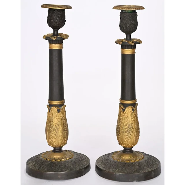 A BEAUTIFUL PAIR OF RESTORED BRONZE CANDLESTICKS with a double green