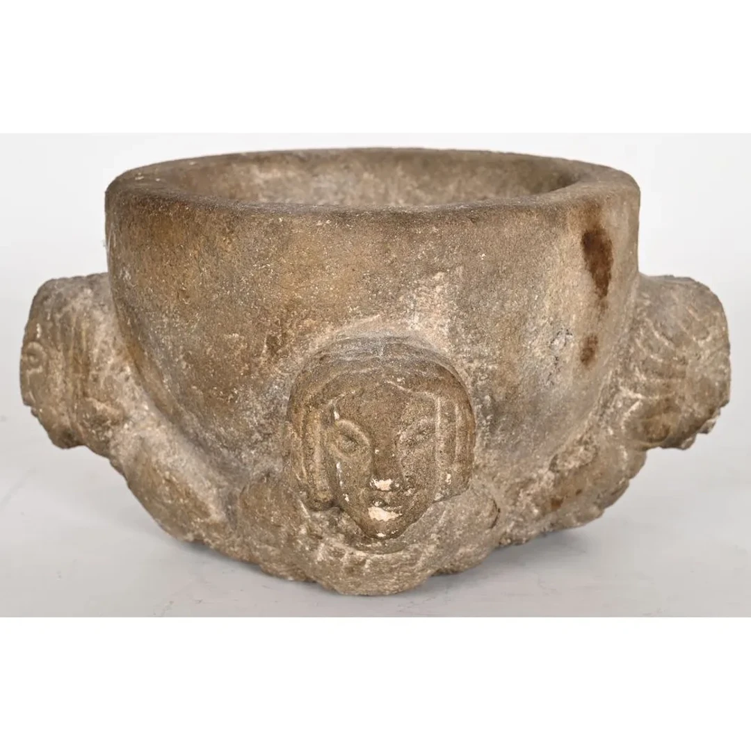 MEDIEVAL STONE MORTAR or FONT with relief decoration featuring four