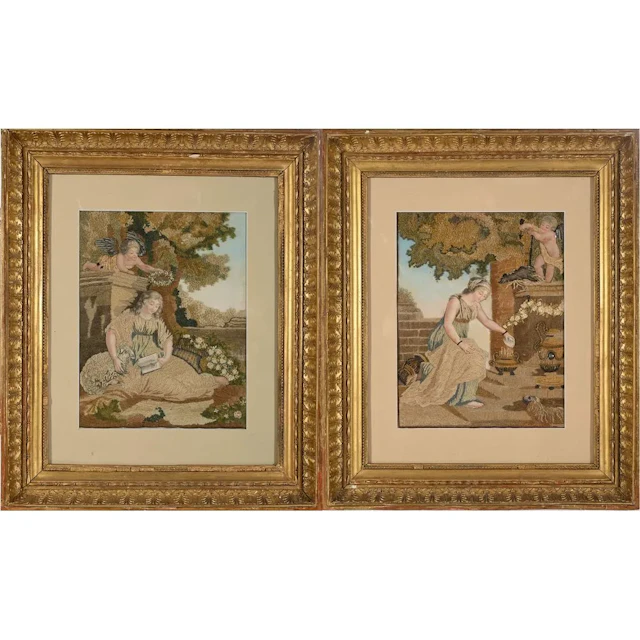 PAIR OF EMBROIDERED PAINTINGS depicting Cupid bestowing love and a