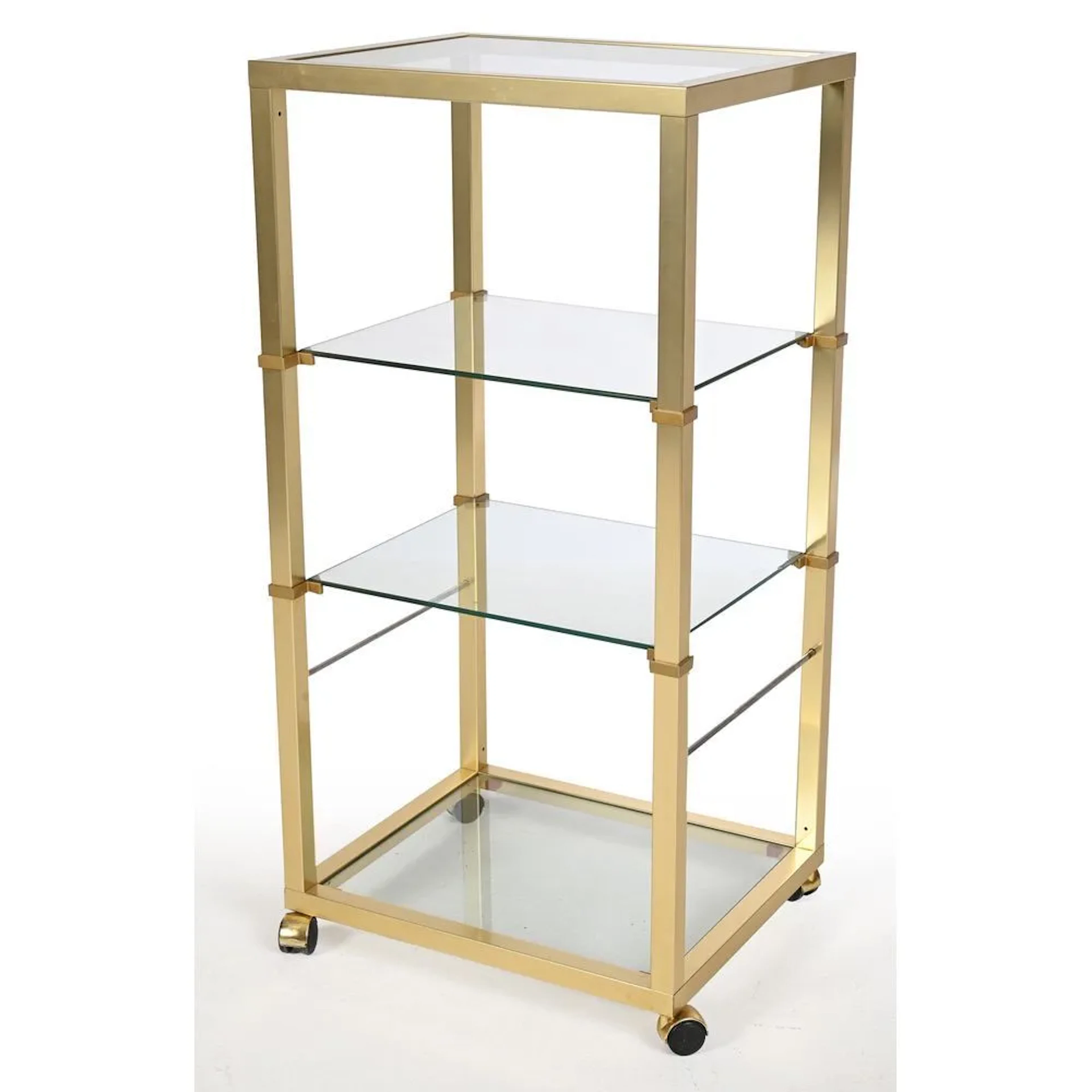 VANDEL Pierre, Paris. MODERNIST brass shelf unit on casters with 4