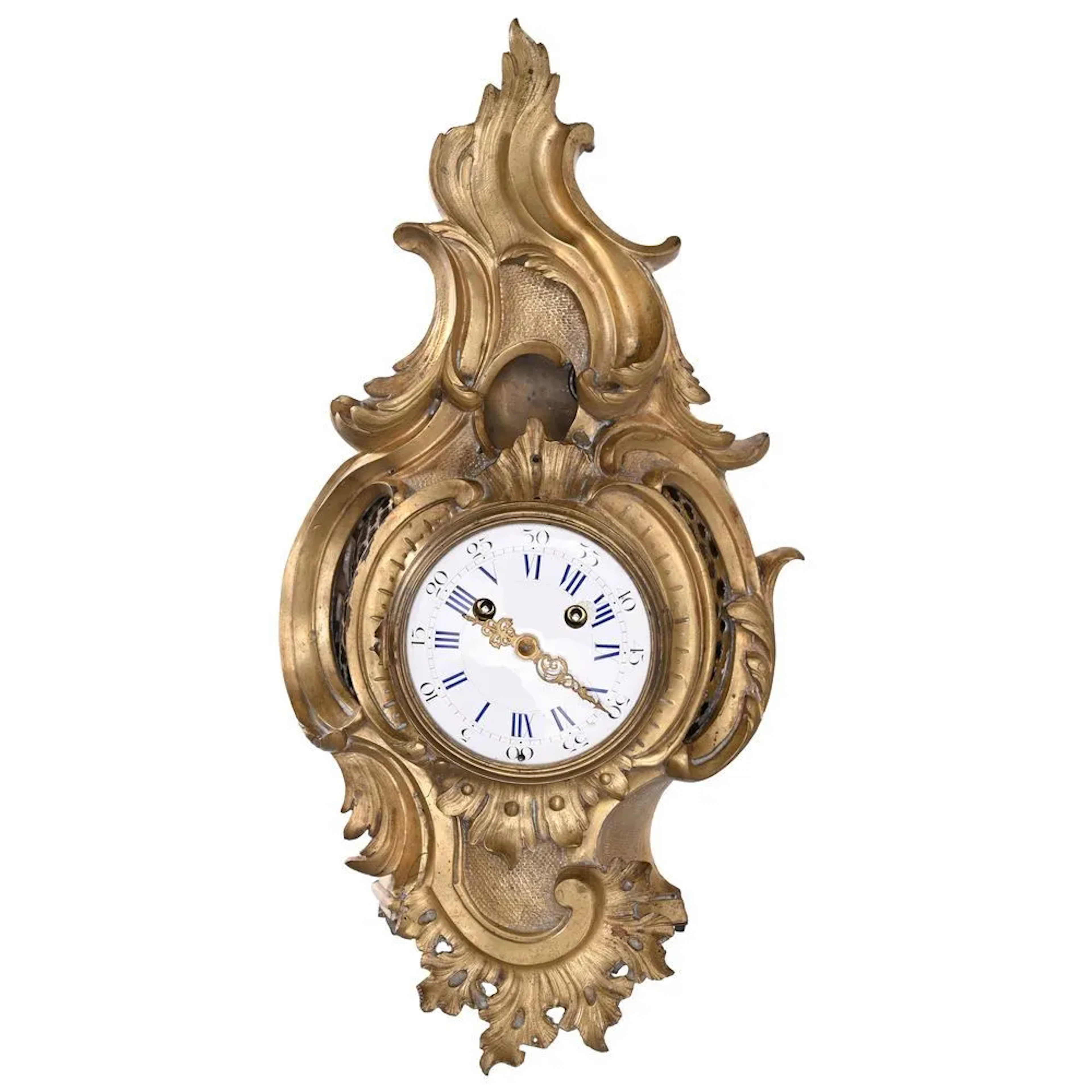 LOUIS XV CARTEL in gilded bronze with molded and sculpted foliage
