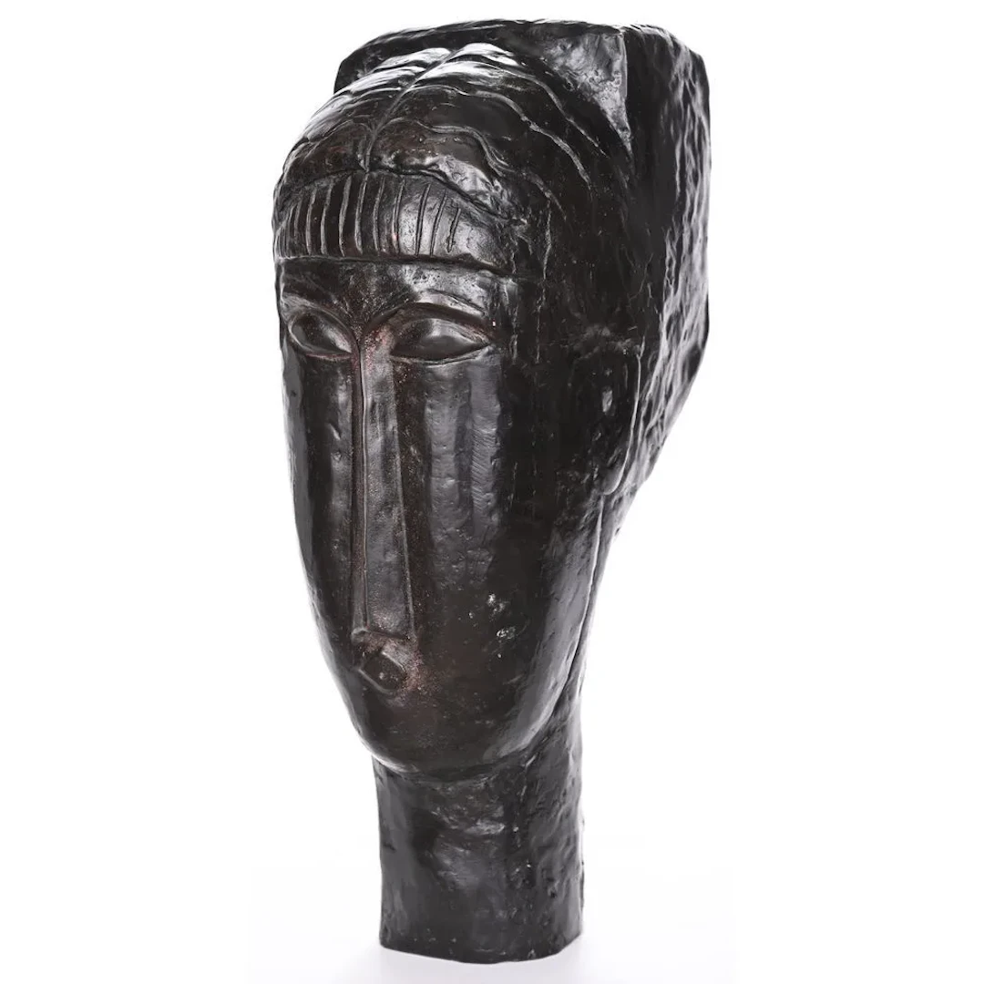 MODIGLIANI, Amedeo. (1884–1920). “Young Girl with Bangs (1912).” Bronze
