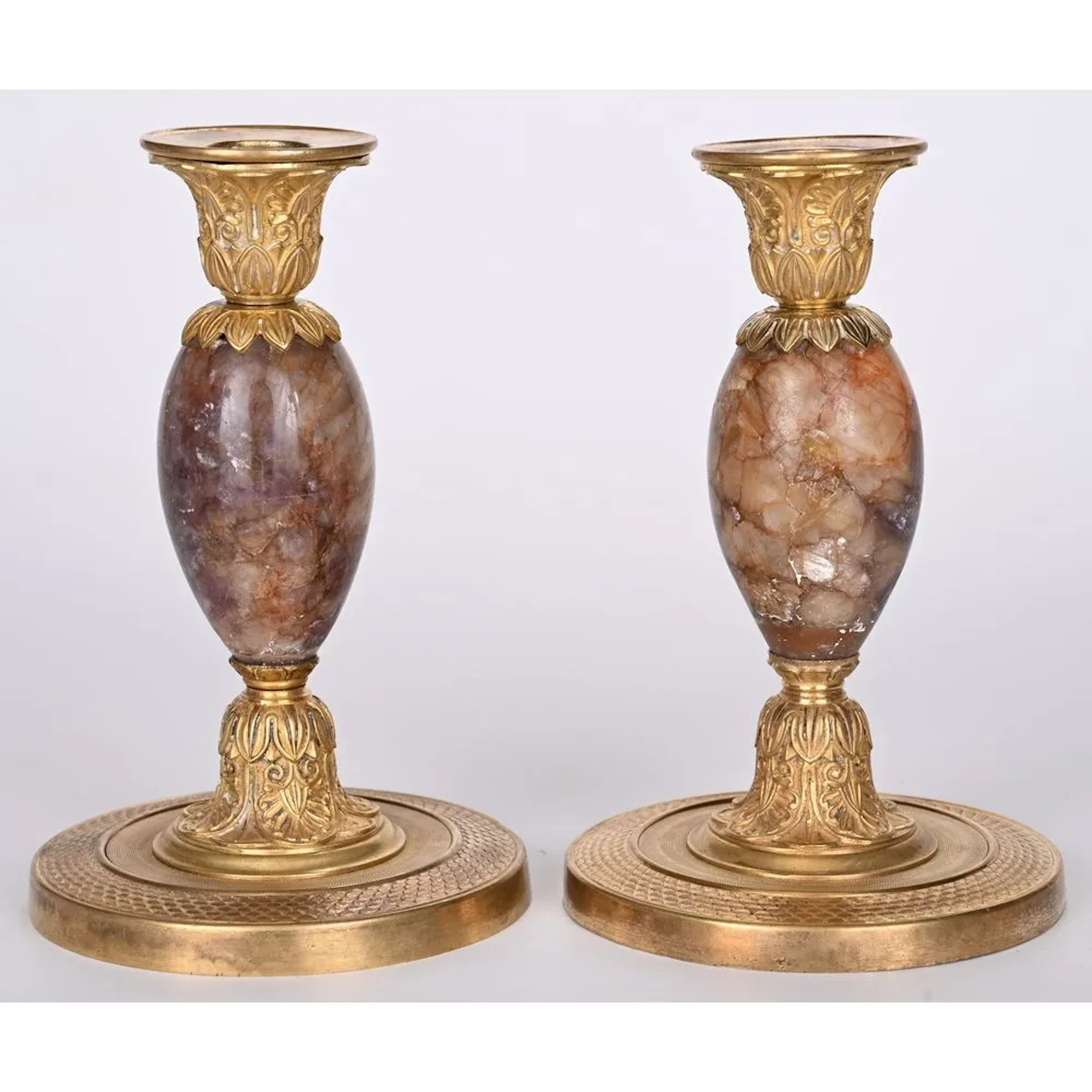 PAIR OF CHARLES X CANDLESTICKS in bronze and fluorite. Round, guilloché