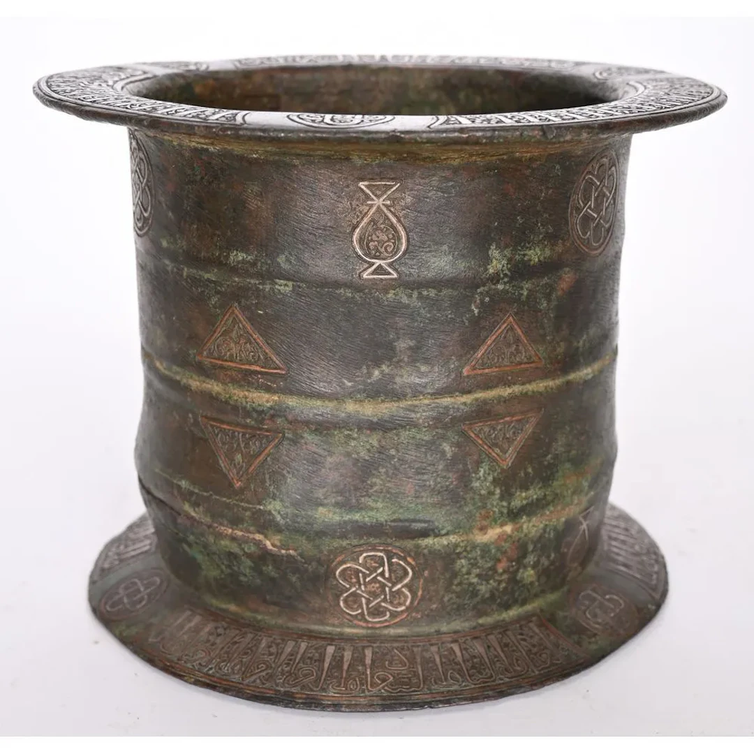 Arabic bronze mortar, cylindrical in shape, decorated with oriental