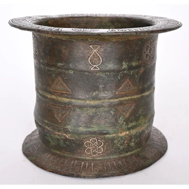 Arabic bronze mortar, cylindrical in shape, decorated with oriental