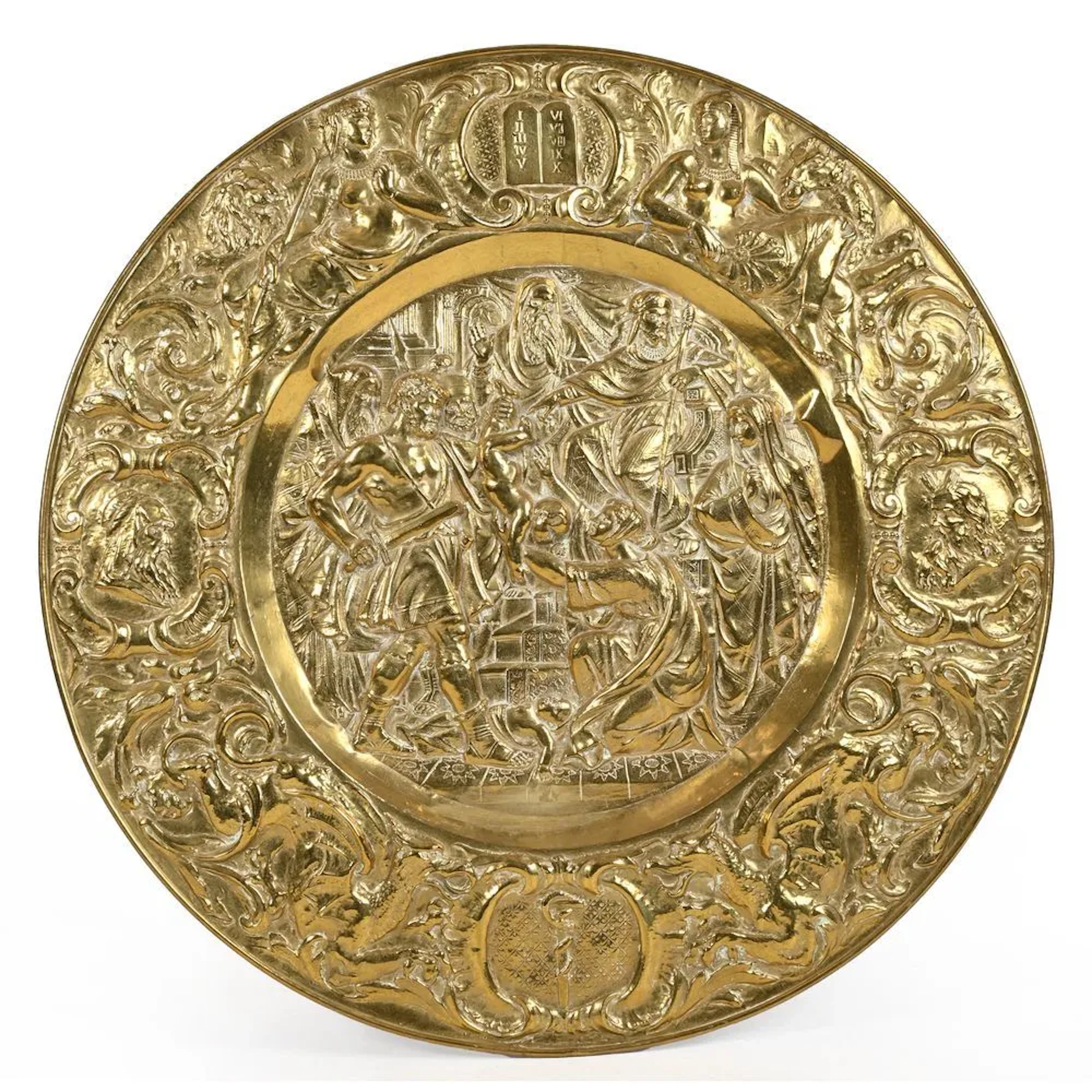 EXCEPTIONAL CASTLE PLATE made of repoussé metal, featuring a mythological